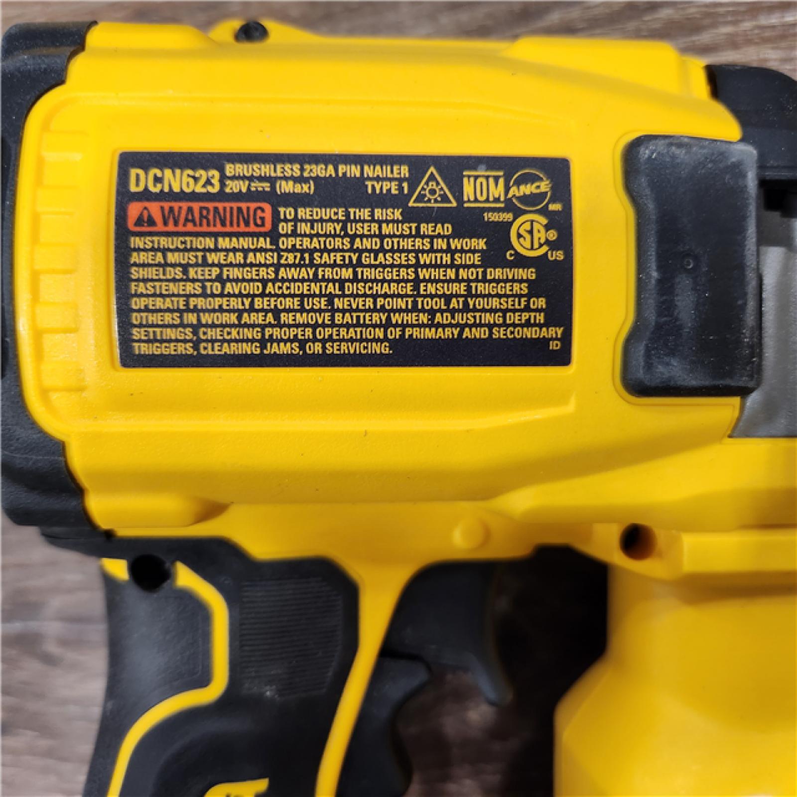 AS-IS DEWALT ATOMIC 20V MAX Lithium Ion Cordless 23 Gauge Pin Nailer Kit with 2.0Ah Battery and Charger