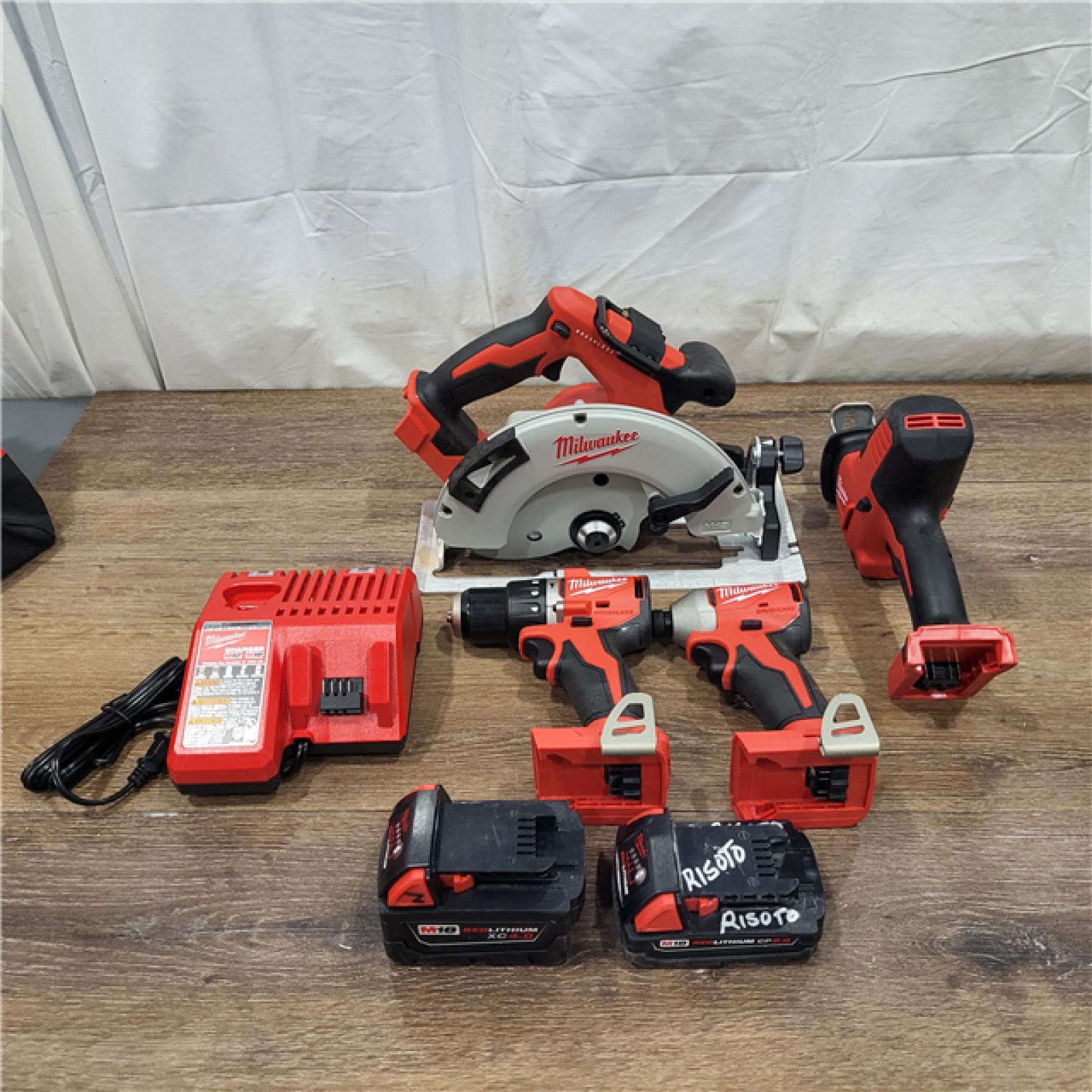 AS-IS M18 18-Volt Lithium-Ion Brushless Cordless Combo Kit (4-Tool) with 2-Batteries, 1-Charger and Tool Bag