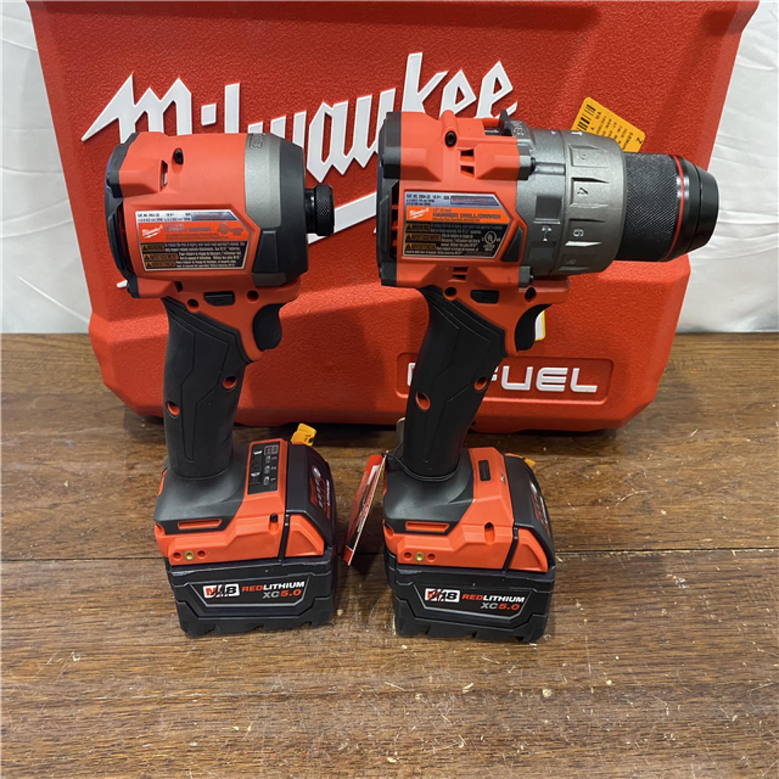 AS-ISMilwaukee M18 FUEL 18V Lithium-Ion Brushless Cordless Hammer Drill and Impact Driver Combo Kit (2-Tool) with 2 Batteries