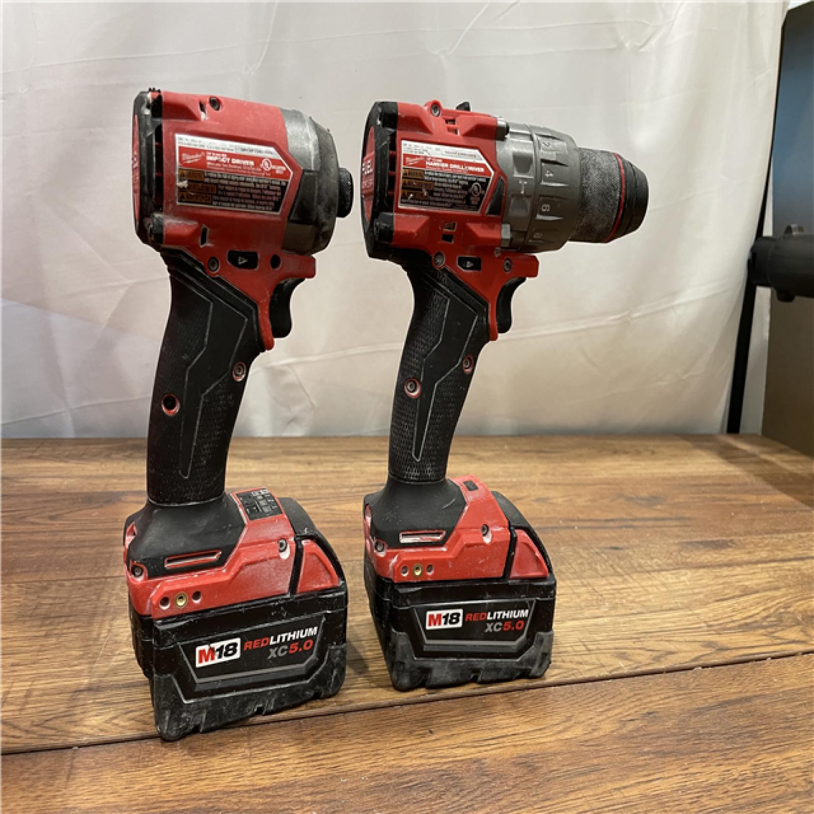 AS-IS Milwaukee M18 FUEL 18V Lithium-Ion Brushless Cordless Hammer Drill and Impact Driver Combo Kit