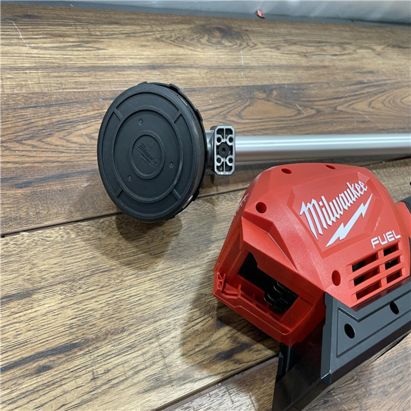 AS-IS Milwaukee M18 FUEL 18V Lithium-Ion Brushless Cordless String Trimmer with QUIK-LOK Attachment Capability and 8.0 Ah Battery