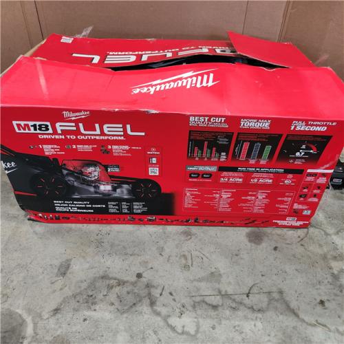 Houston location- AS-IS MILWUAKEE M18 FUEL Brushless Cordless 21 in. Walk Behind Dual Battery Self-Propelled Mower W/(2) 12.0Ah Battery and Rapid Charger