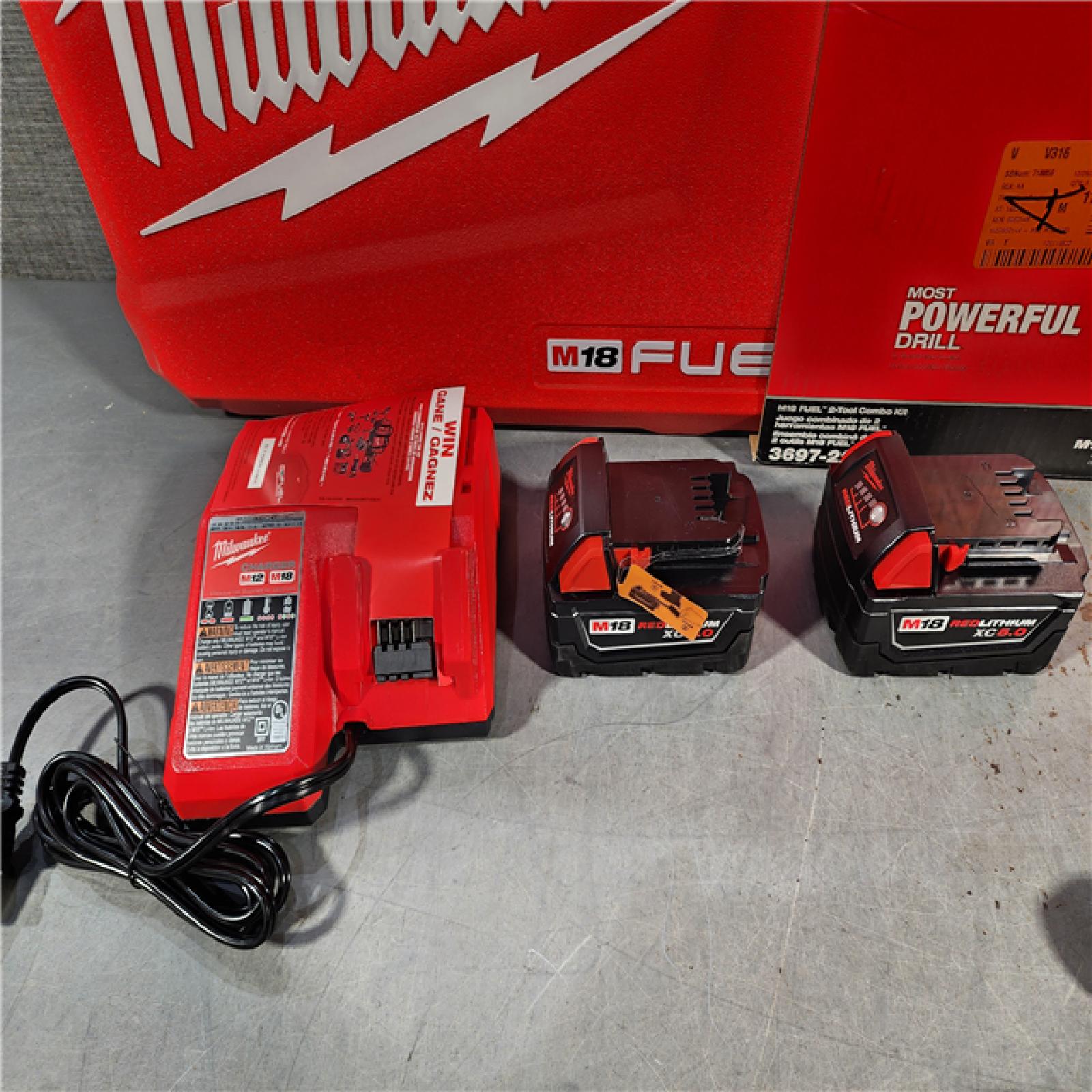 HOUSTON LOCATION - AS-IS (APPEARS LIKE NEW) Milwaukee M18 FUEL 18V Lithium-Ion Brushless Cordless Hammer Drill and Impact Driver Combo Kit (2-Tool) with 2 Batteries