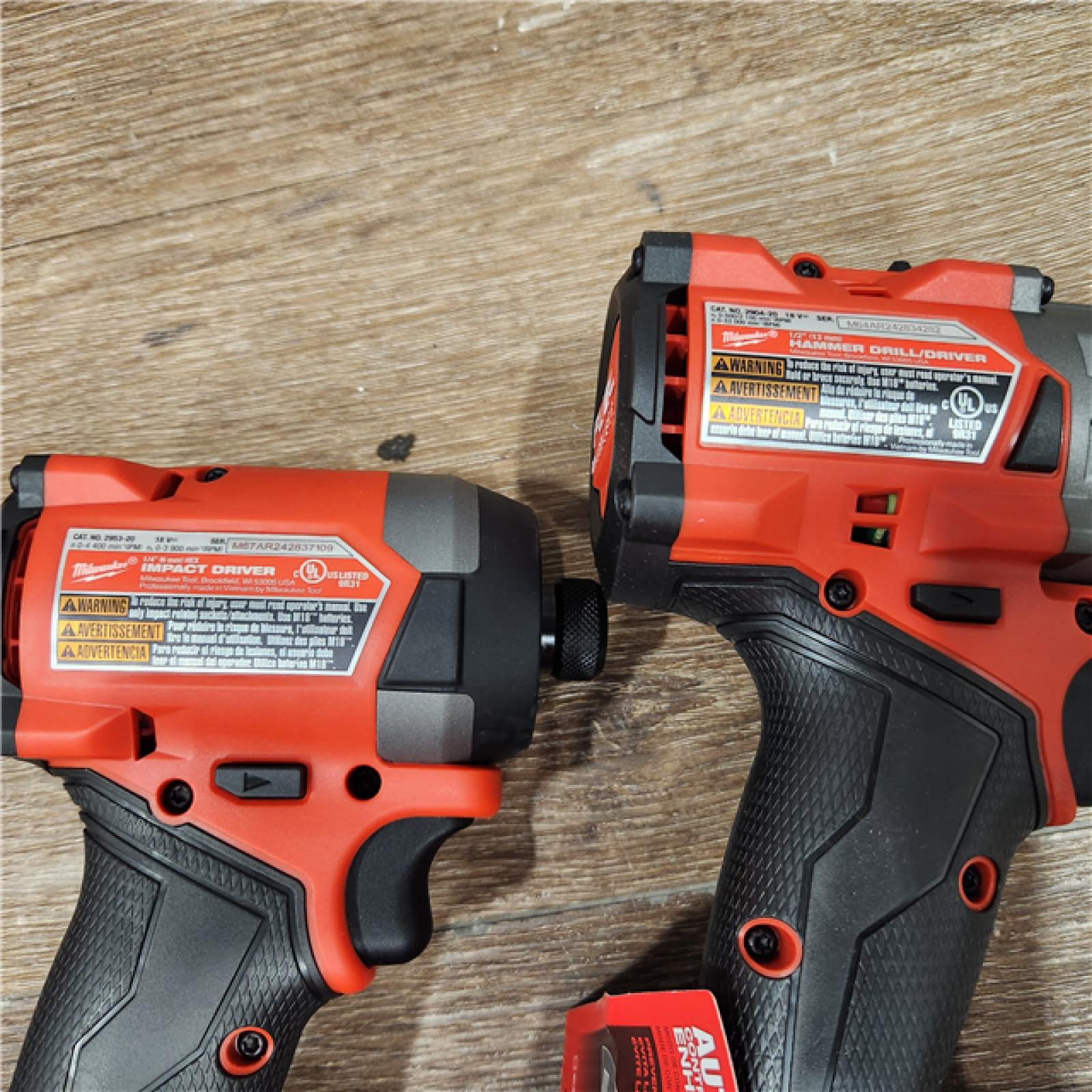 AS-IS Milwaukee 2697-22 M18 18-Volt 1/2-Inch 2-Tool Combo Kit Includes Charger, Battery (2) and Bag