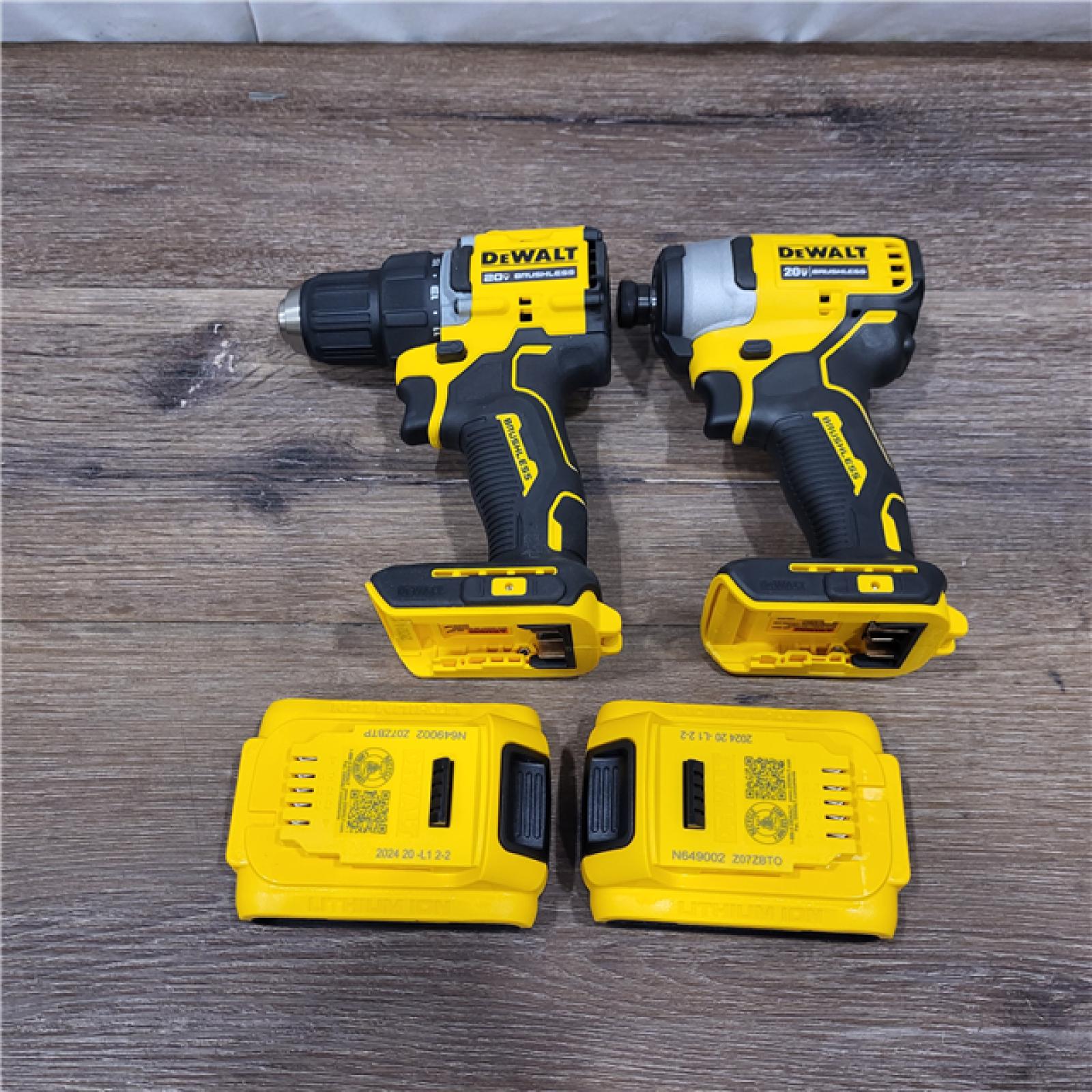 AS-IS DEWALT 20V MAX XR Hammer Drill and ATOMIC Impact Driver 2 Tool Cordless Combo Kit with (2) 4.0Ah Batteries, Charger, and Bag