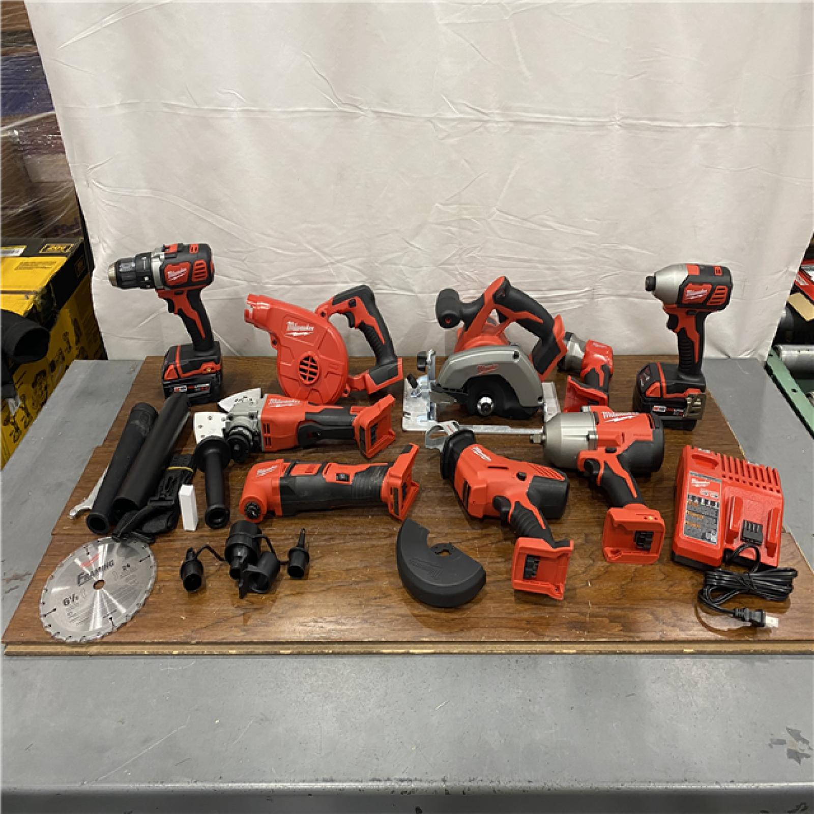 AS-IS M18 18-Volt Lithium-Ion Cordless Combo Kit (9-Tool) with (2) Batteries, Charger, and Tool Bag