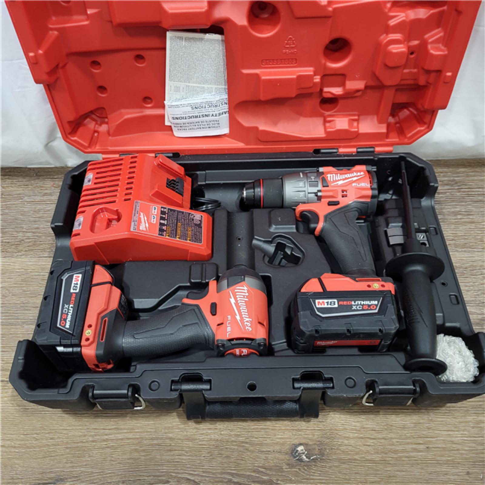 AS-IS M18 FUEL 18V Lithium-Ion Brushless Cordless Hammer Drill and Impact Driver Combo Kit (2-Tool) with 2 Batteries