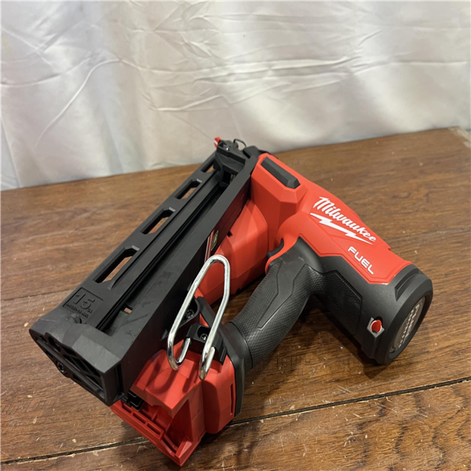 AS-IS Milwaukee 2839-20 M18 FUEL 15 Ga. 18 Volt Brushless Angled Finish Nailer