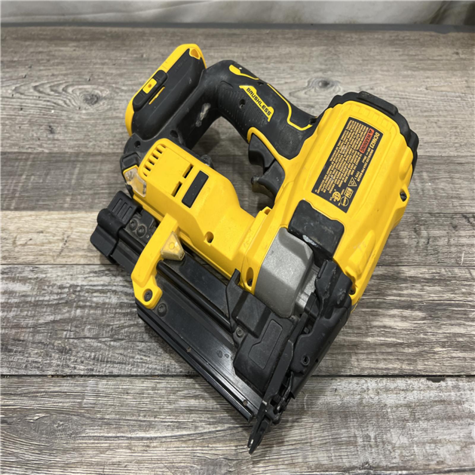 AS-IS DEWALT ATOMIC 20V MAX Lithium Ion Cordless 23 Gauge Pin Nailer Kit with 2.0Ah Battery and Charger