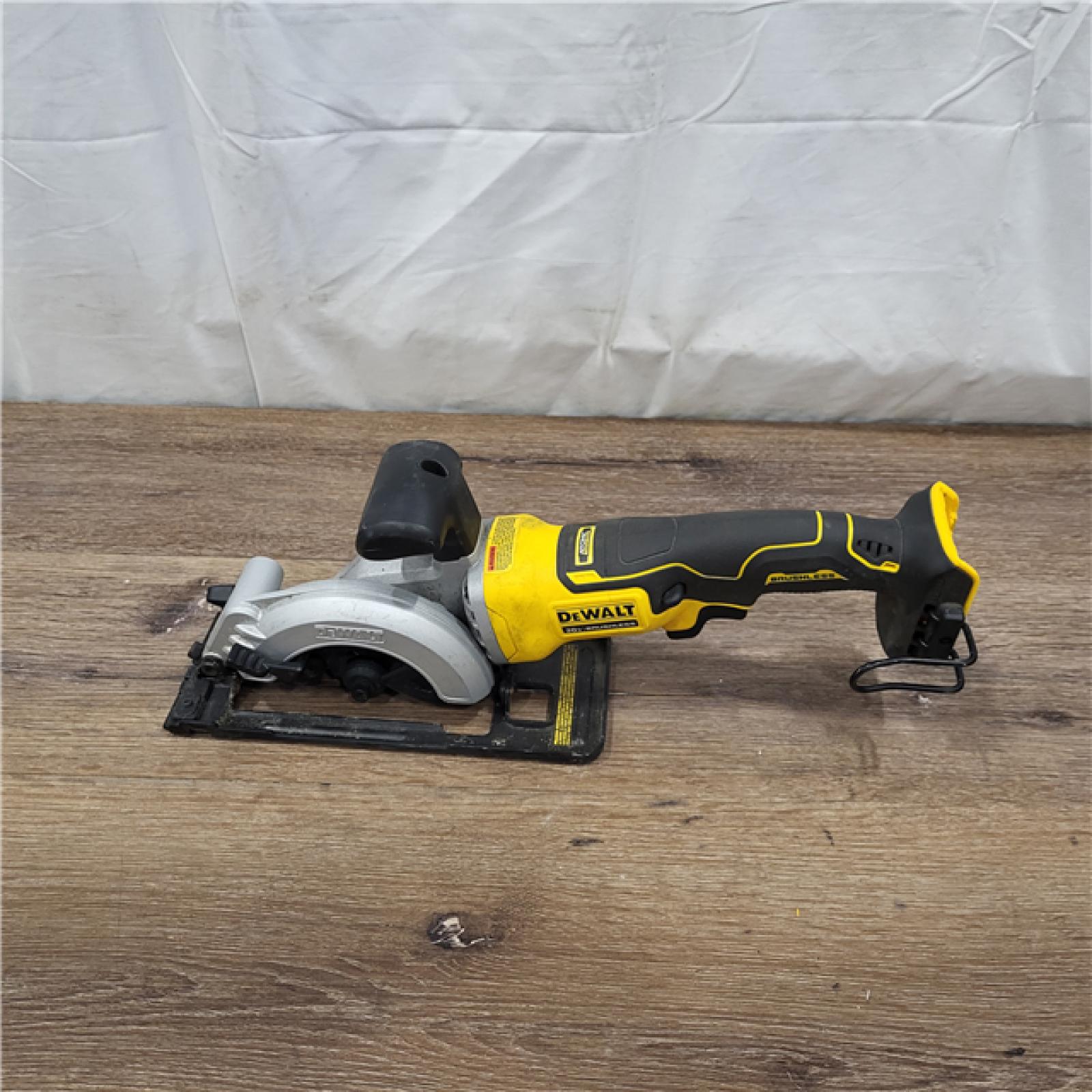 AS-IS ATOMIC 20V MAX Cordless Brushless 4-1/2 in. Circular Saw (Tool Only)