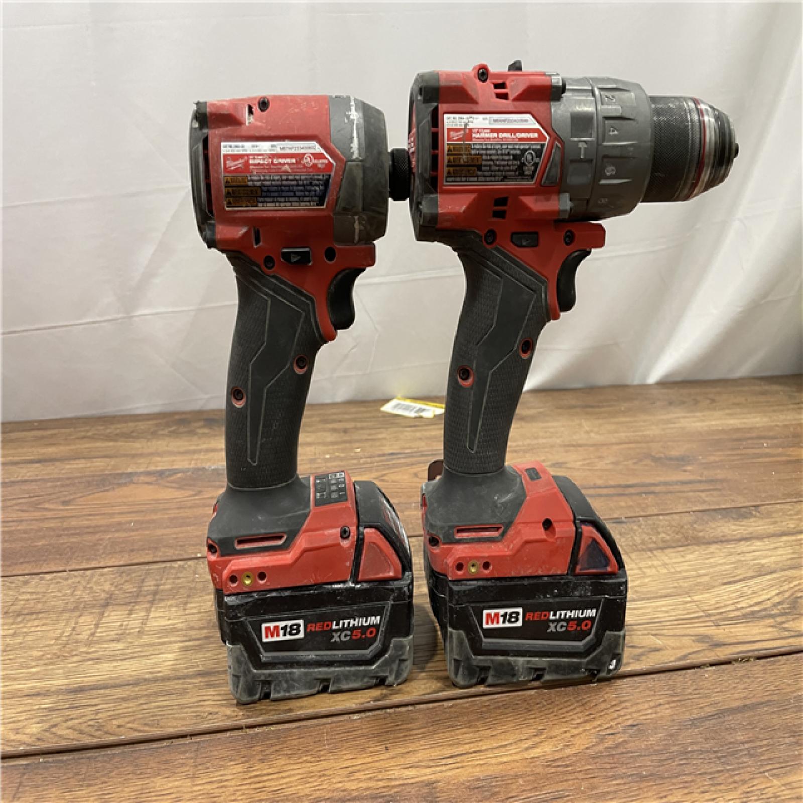 AS-IS MILWAUKEE  M18 FUEL 18V Lithium-Ion Brushless Cordless Hammer Drill and Impact Driver Combo Kit (2-Tool)