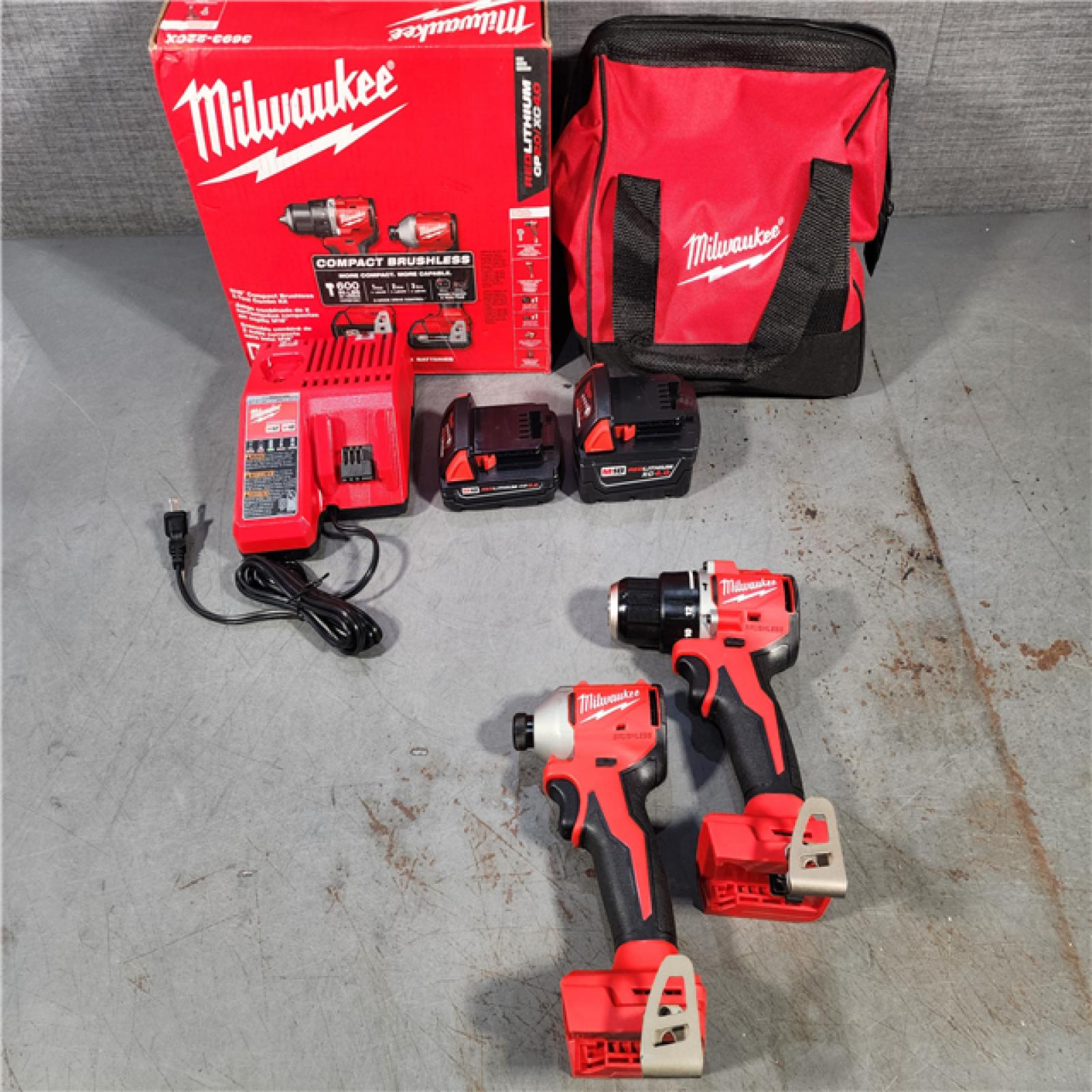 HOUSTON LOCATION - AS-IS M18 18-Volt Lithium-Ion Brushless Cordless Compact Hammer Drill/Impact Combo Kit (2-Tool) with (2) Batteries, Bag