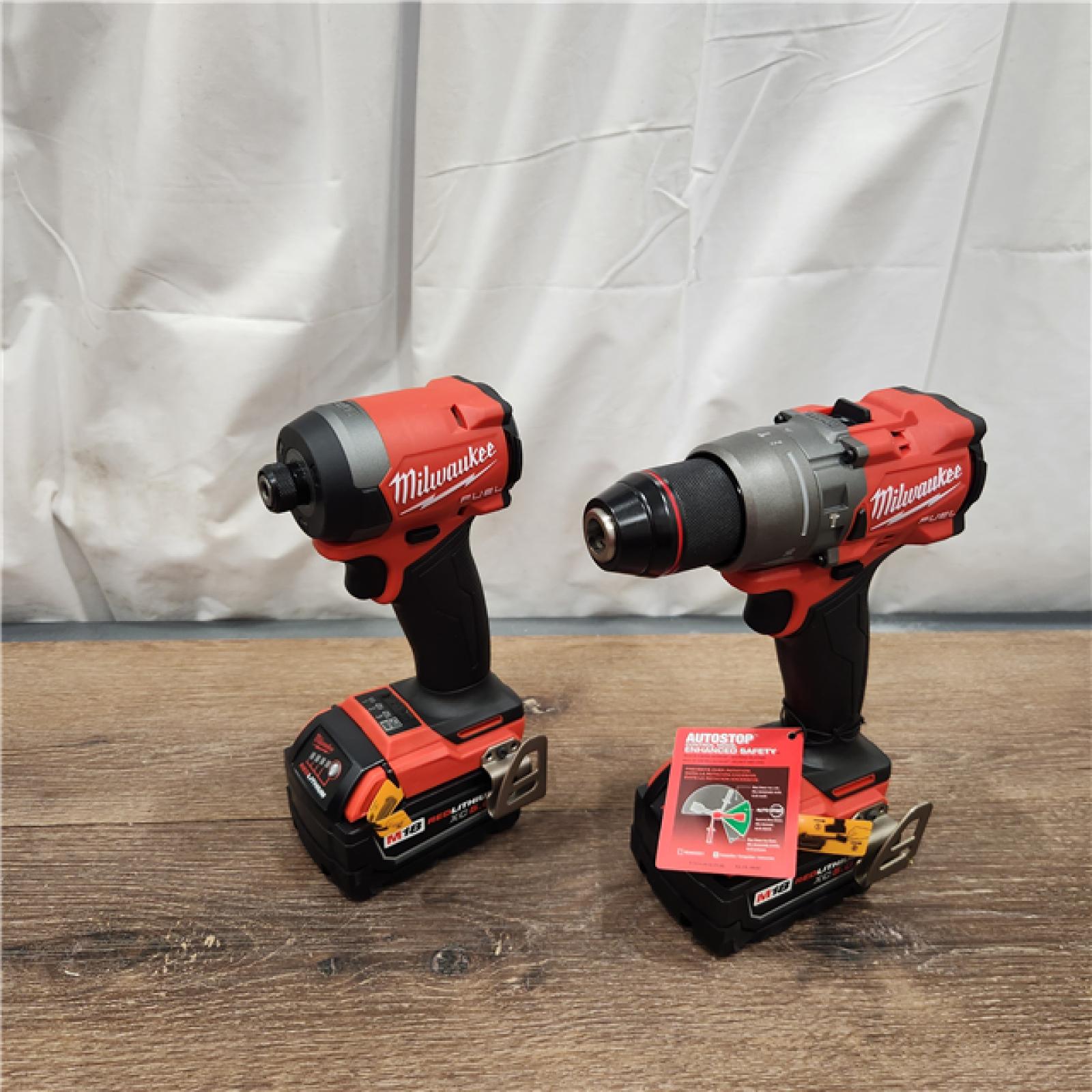 AS-IS Milwaukee M18 FUEL 18V Lithium-Ion Brushless Cordless Hammer Drill and Impact Driver Combo Kit (2-Tool) with 2 Batteries