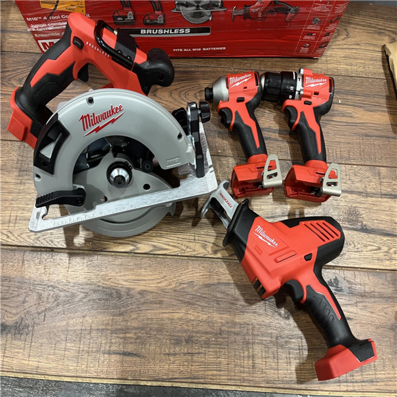 AS-IS Milwaukee M18 18-Volt Lithium-Ion Brushless Cordless Combo Kit (4-Tool) with 2-Batteries, 1-Charger and Tool Bag