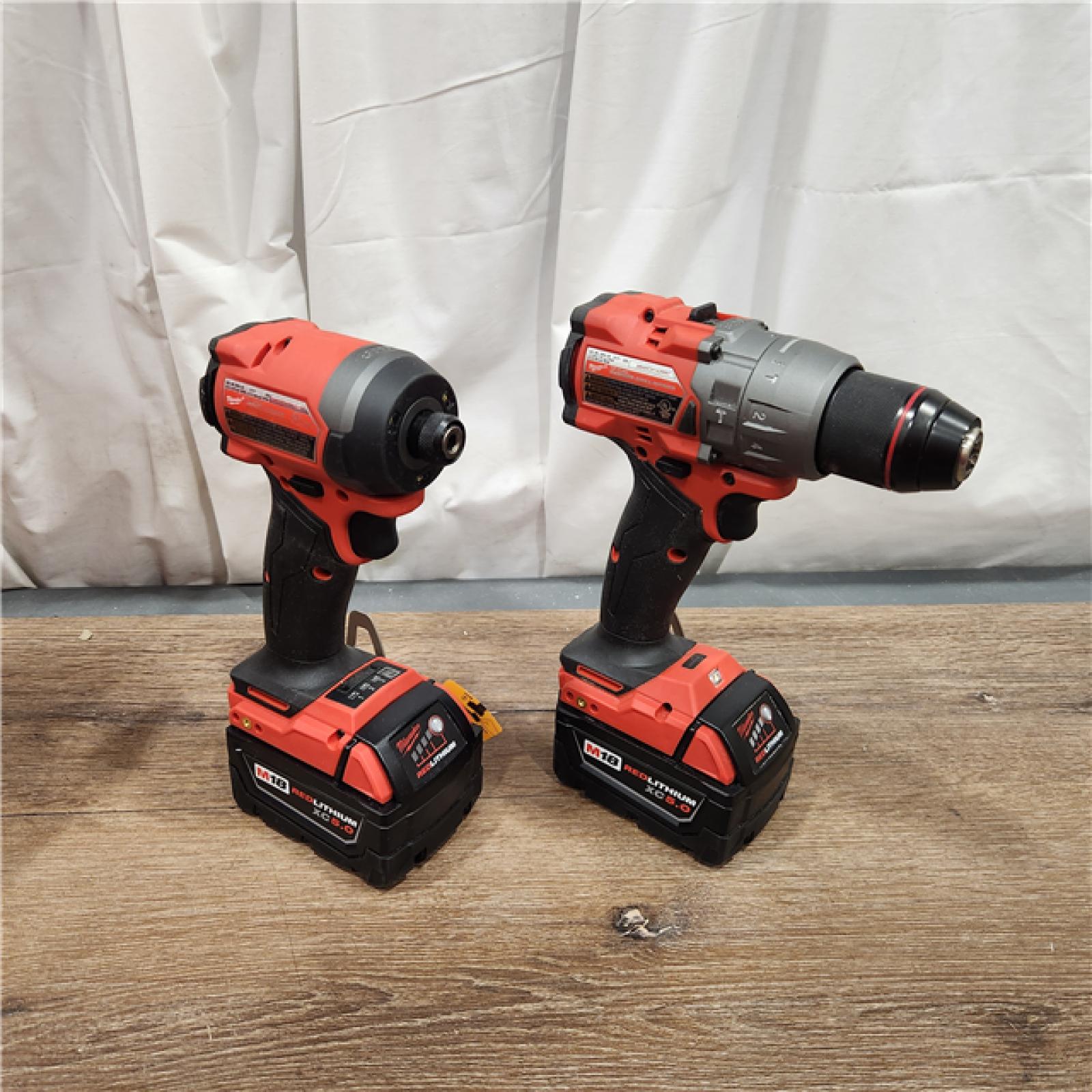 AS-IS Milwaukee M18 FUEL 18V Lithium-Ion Brushless Cordless Hammer Drill and Impact Driver Combo Kit (2-Tool) with 2 Batteries