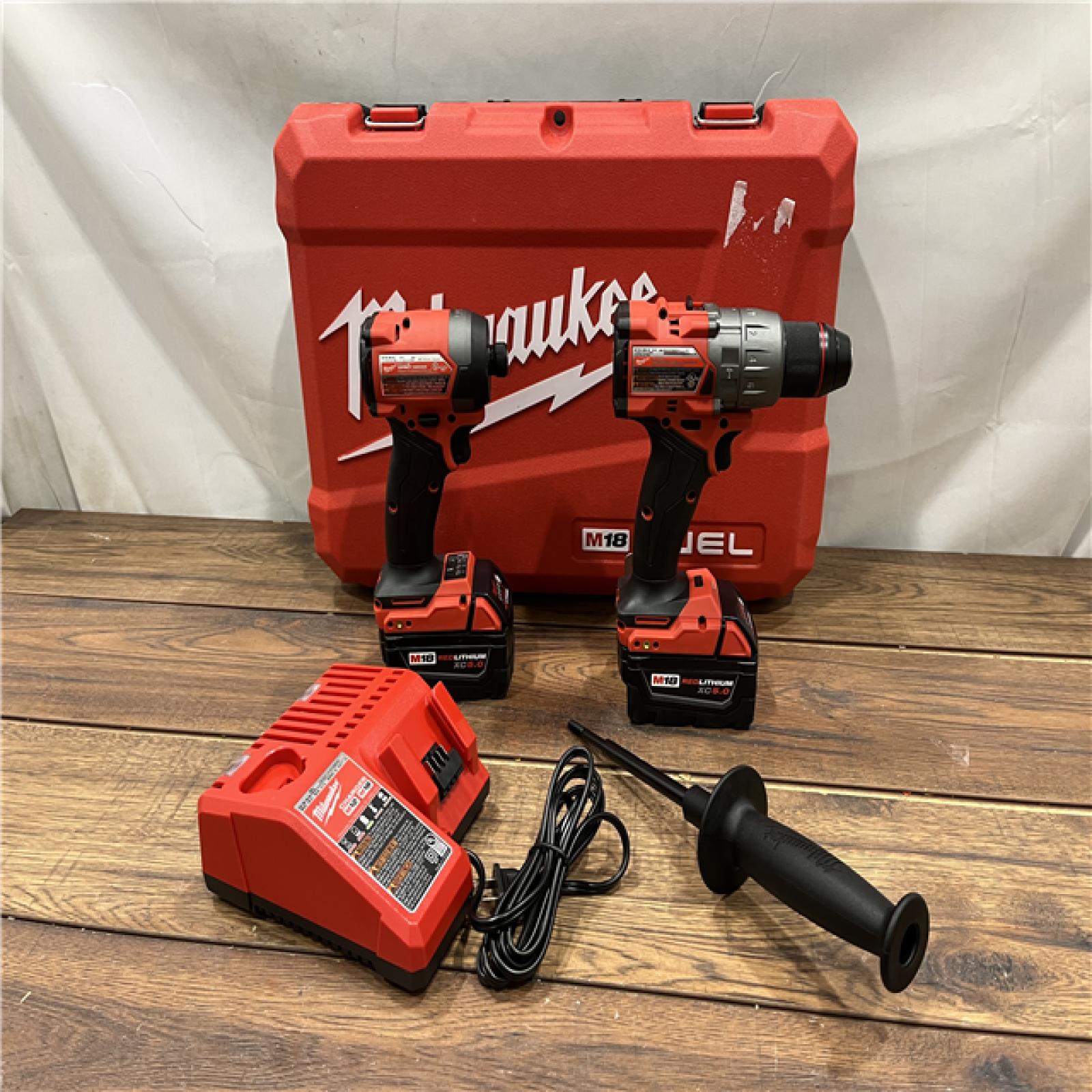 AS-IS Milwaukee M18 FUEL 18V Lithium-Ion Brushless Cordless Hammer Drill and Impact Driver Combo Kit (2-Tool) with 2 Batteries