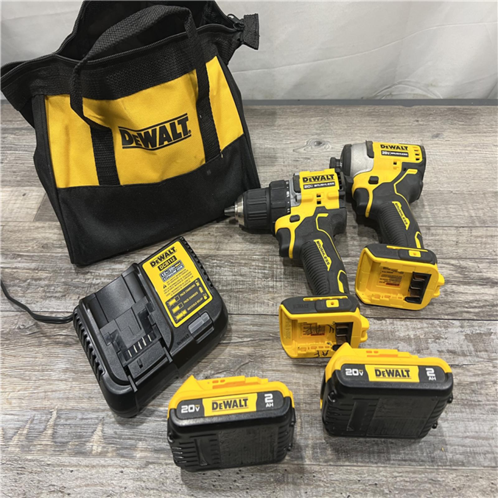 AS-IS Dewalt DCK225D2 20V MAX ATOMIC Brushless Compact Lithium-Ion 1/2 in. Cordless Drill Driver and 1/4 in. Impact Driver Combo Kit with 2 Batteries 2 Ah