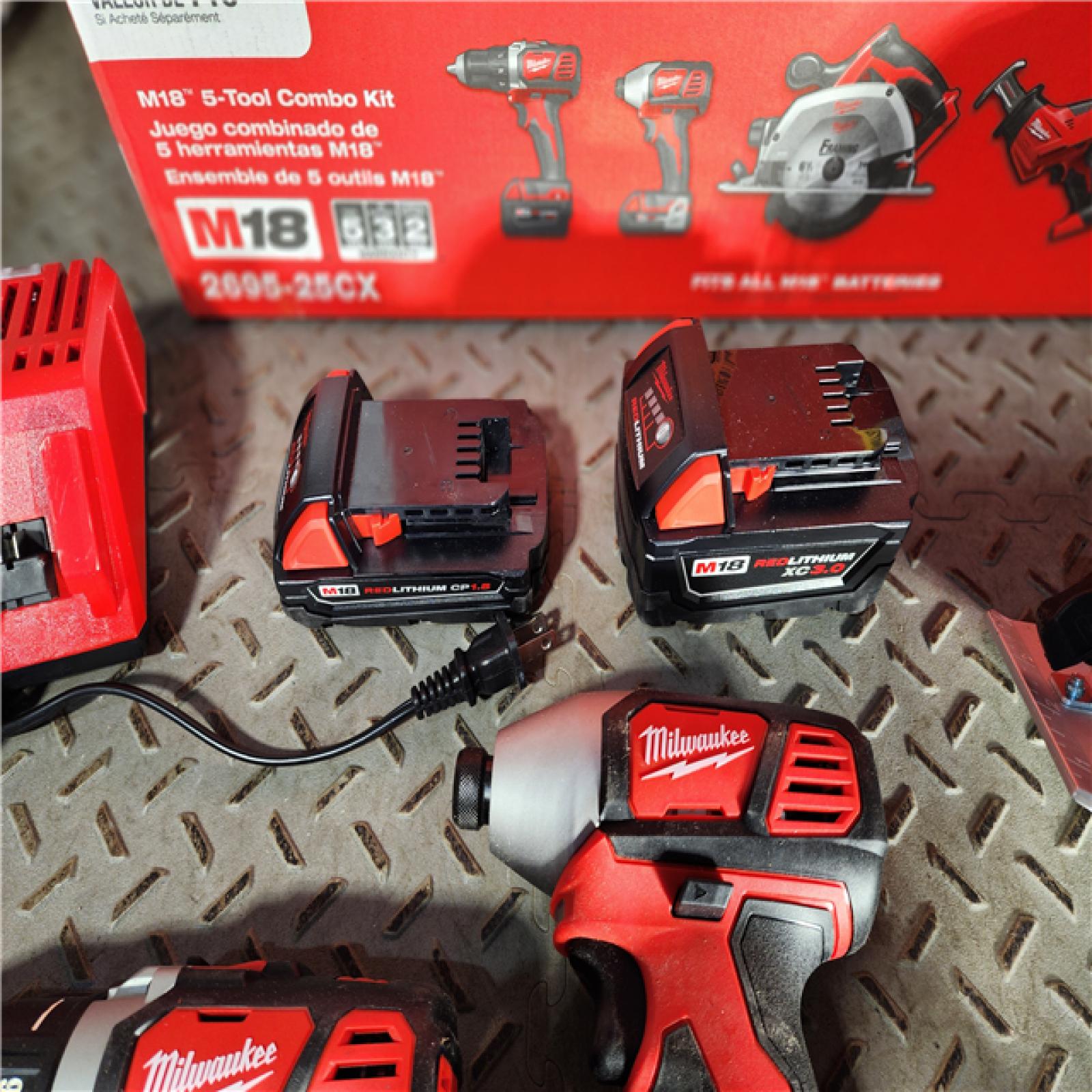 HOUSTON LOCATION - AS-IS Milwaukee M18 18-Volt Lithium-Ion Cordless Combo Tool Kit (5-Tool) with (1) 3.0Ah and (1) 1.5Ah Battery, (1) Charger, (1) Tool Bag