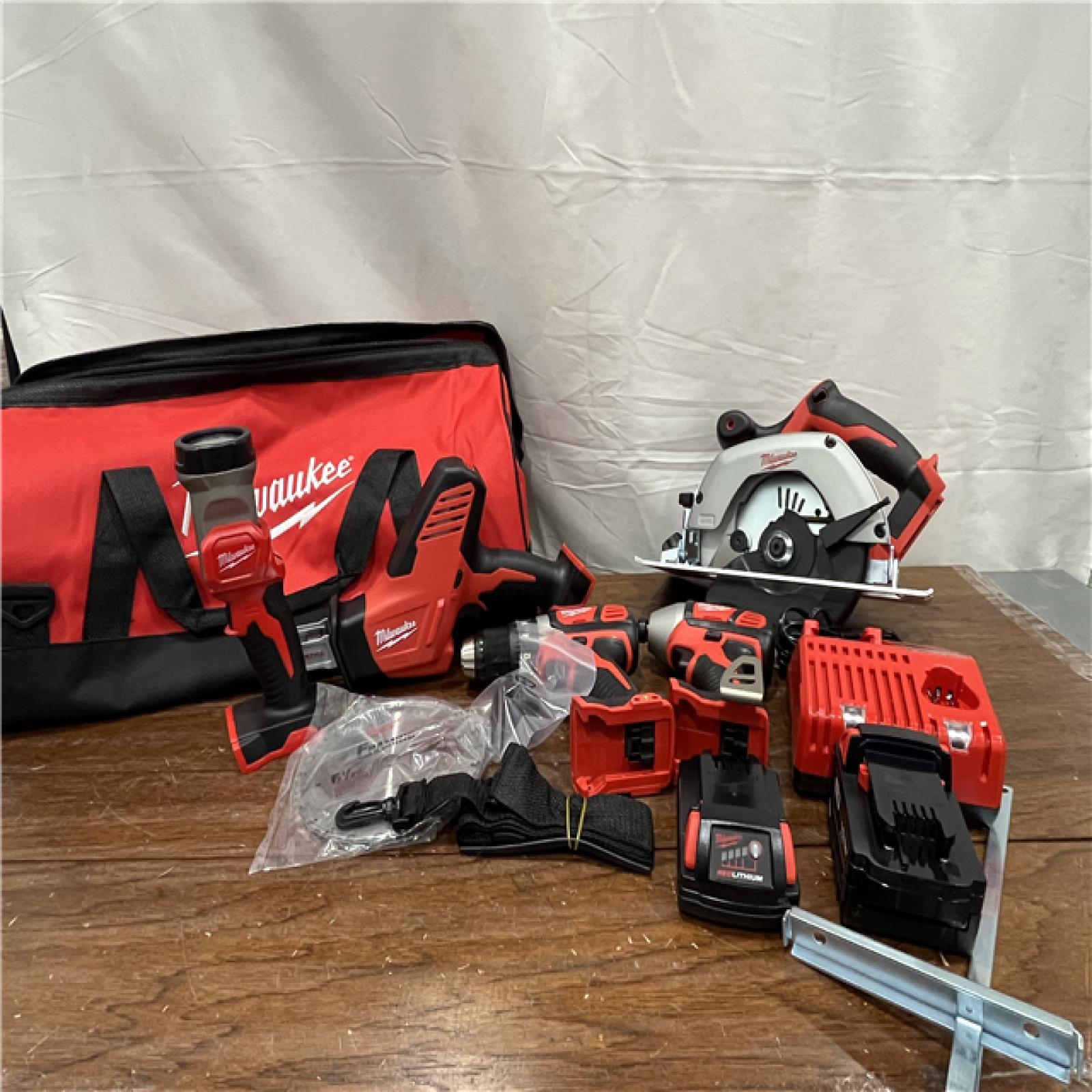 AS-IS M18 18V Lithium-Ion Cordless Combo Kit (5-Tool) with (1) 3.0Ah and (1) 1.5Ah Battery, (1) Charger, (1) Tool Bag