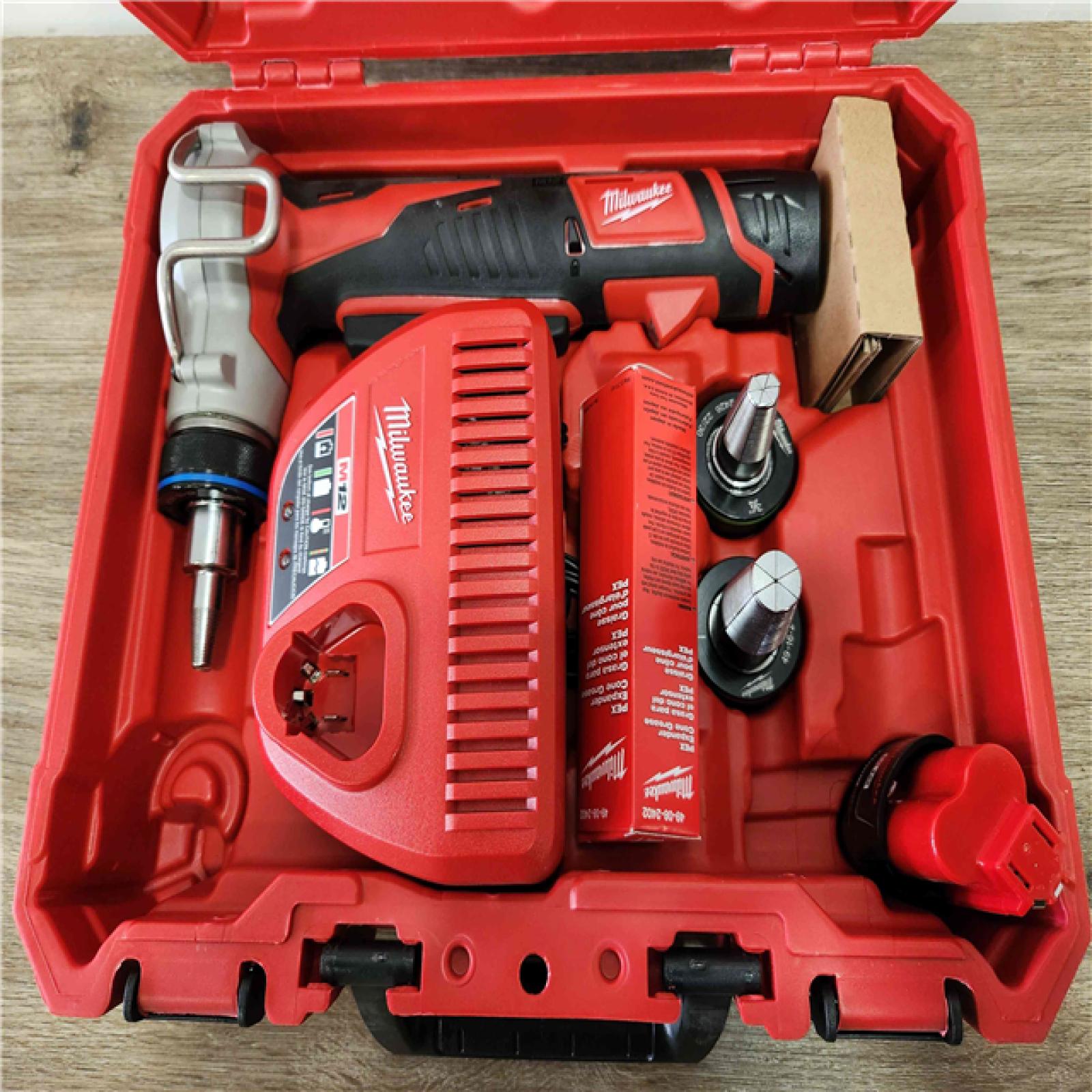 Phoenix Location Appears NEW Milwaukee M12 Cordless PEX Expansion Tool Kit with 1 in. Plastic Tubing Cutter 2474-232