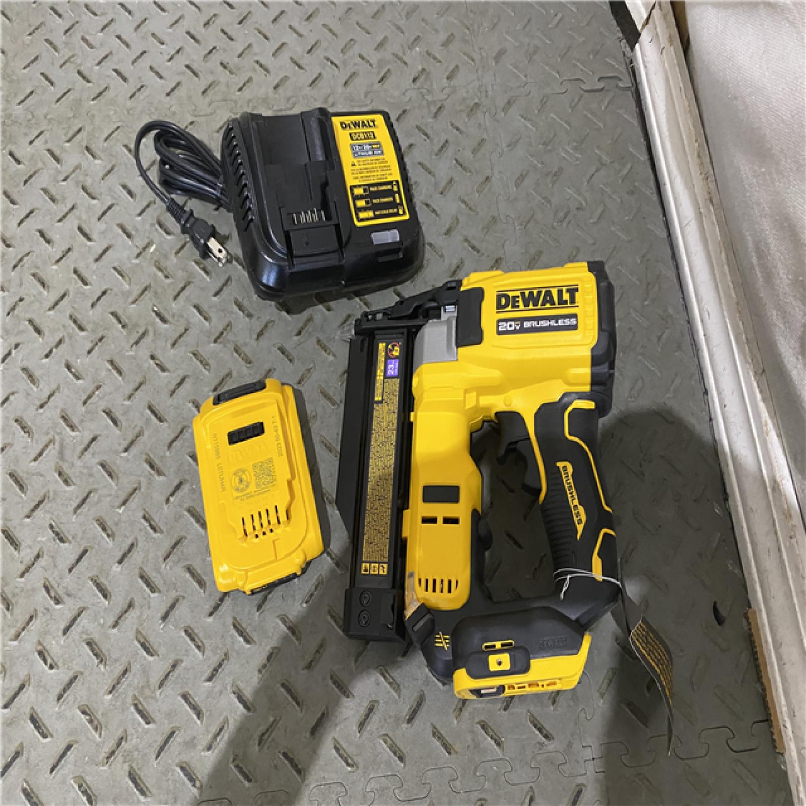 Houston location AS-IS DEWALT ATOMIC 20V MAX Lithium Ion Cordless 23 Gauge Pin Nailer Kit with 2.0Ah Battery and Charger