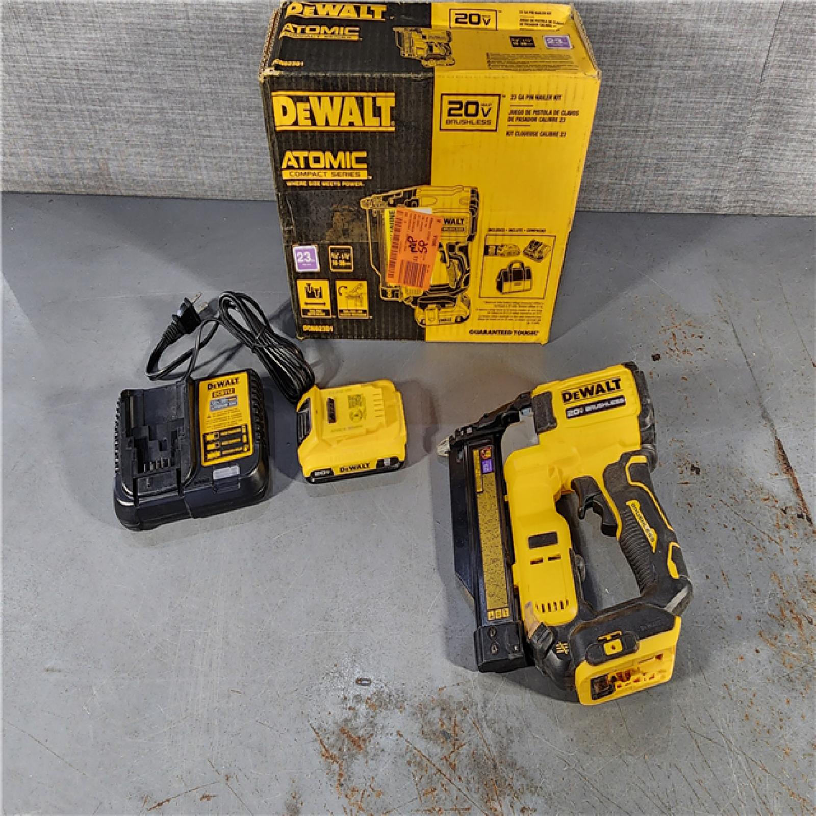 HOUSTON LOCATION - AS-IS DEWALT ATOMIC 20V MAX Lithium Ion Cordless 23 Gauge Pin Nailer Kit with 2.0Ah Battery and Charger (NO TOOL BAG)