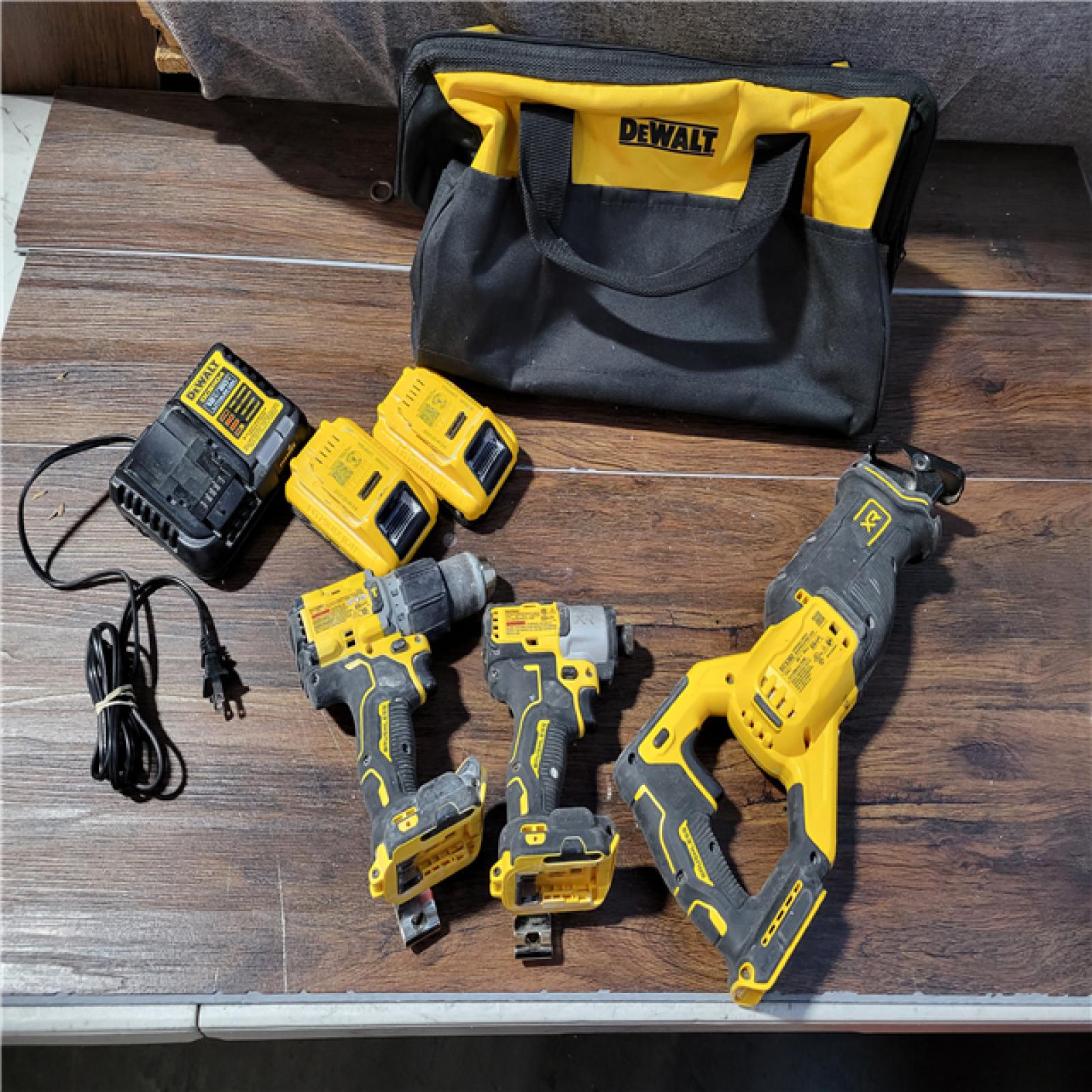 CALIFORNIA USED PARTIAL DEWALT 4-TOOL COMBO KIT (2 BATTERIES, 1 CHARGER, AND BAG INCLUDED