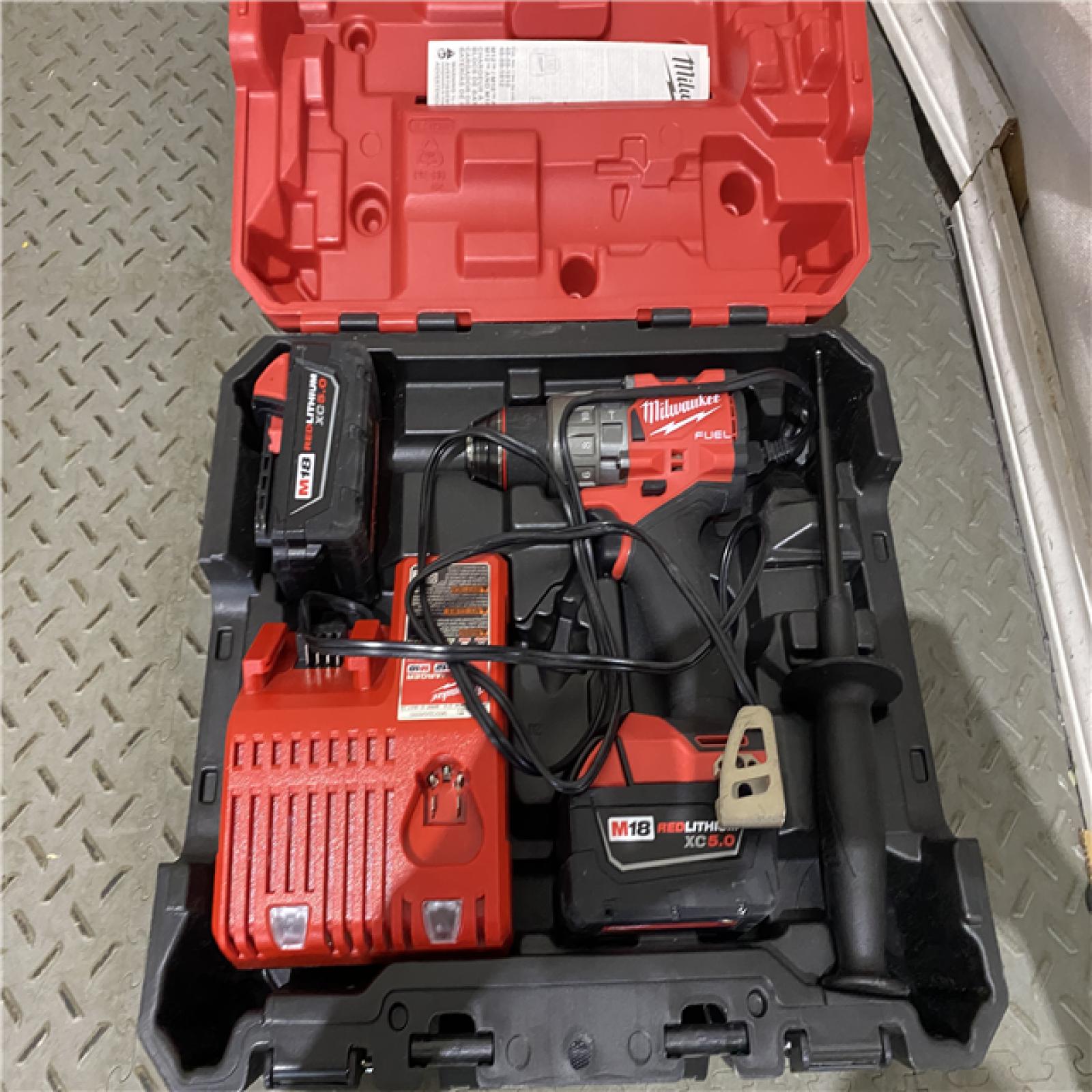 Houston location AS-IS Milwaukee 2904-22 Hammer Drill Driver Kit with Batteries  Charger & Tool Case  Red