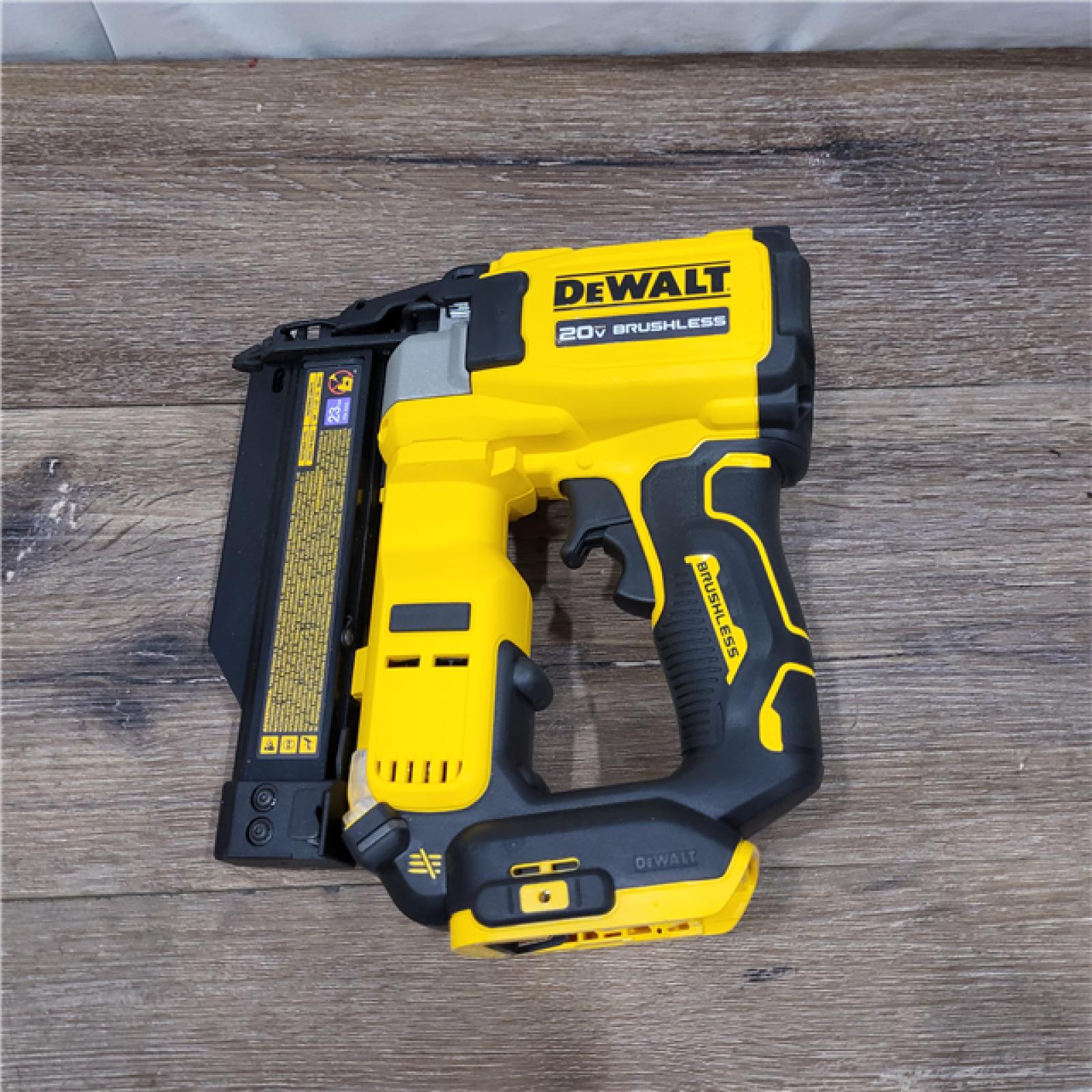 AS-IS DEWALT ATOMIC 20V MAX Lithium Ion Cordless 23 Gauge Pin Nailer Kit with 2.0Ah Battery and Charger