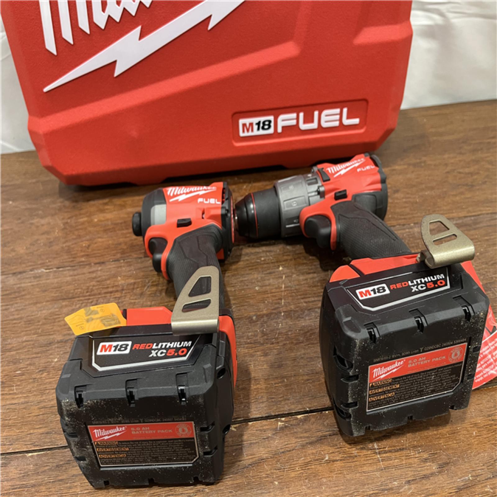 AS-ISMilwaukee M18 FUEL 18V Lithium-Ion Brushless Cordless Hammer Drill and Impact Driver Combo Kit (2-Tool) with 2 Batteries