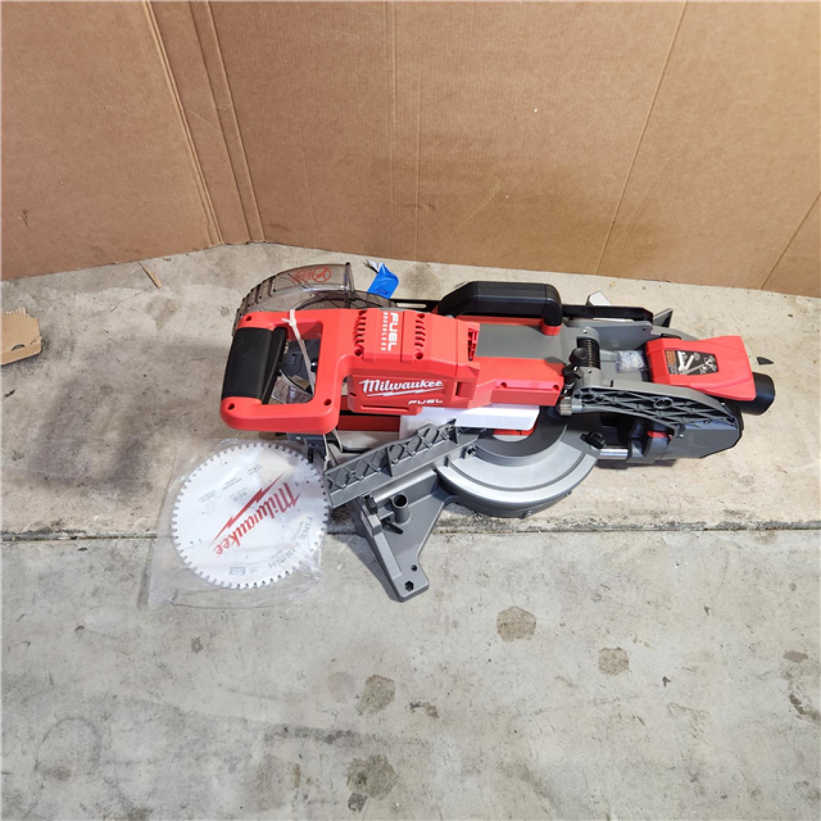 Houston location- AS-IS MILWAUKEE M18 FUEL 18V 10 in. Lithium-Ion Brushless Cordless Dual Bevel Sliding Compound Miter Saw ONLY TOOL