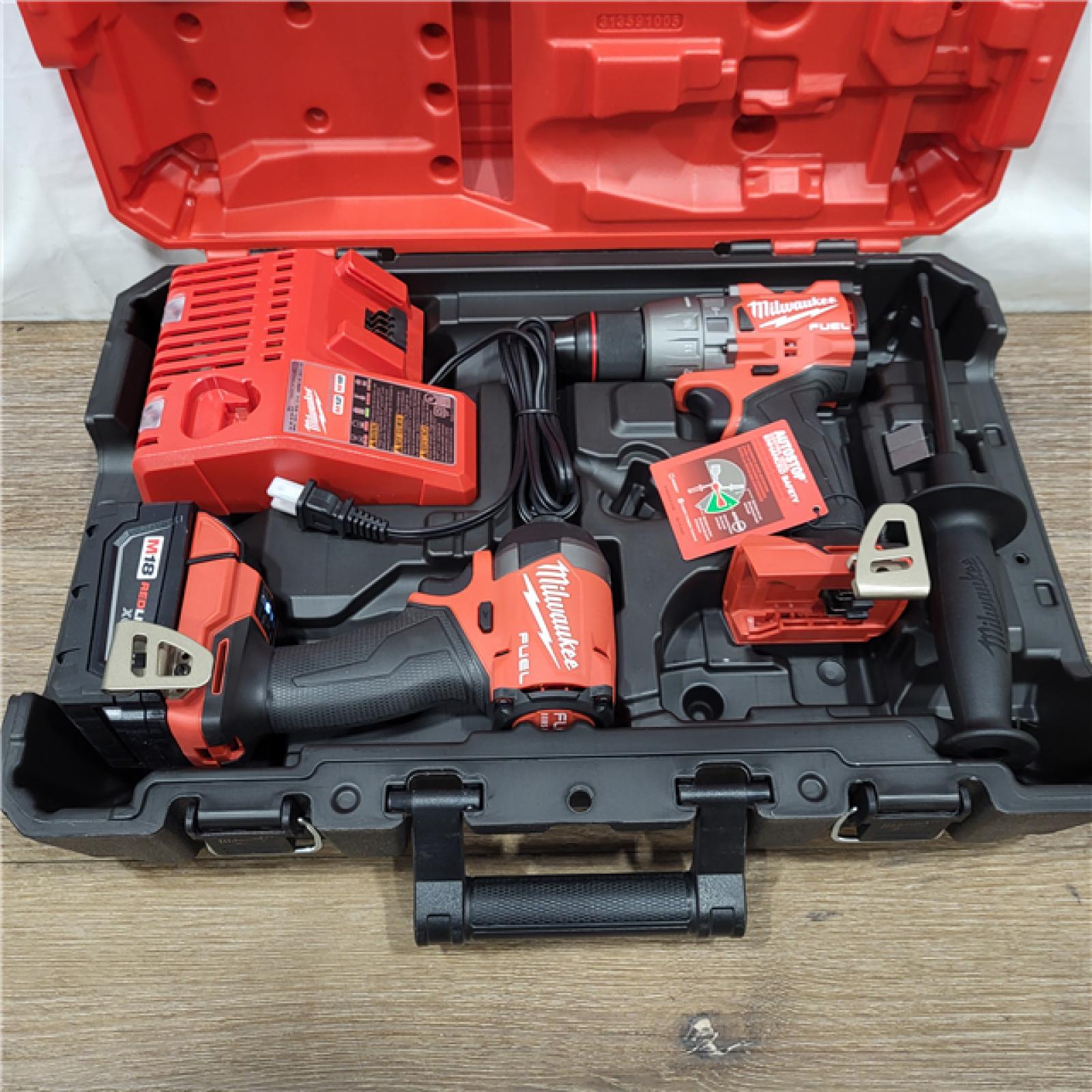 AS-IS Milwaukee M18 FUEL 18V Lithium-Ion Brushless Cordless Hammer Drill and Impact Driver Combo Kit (2-Tool) with 2 Batteries