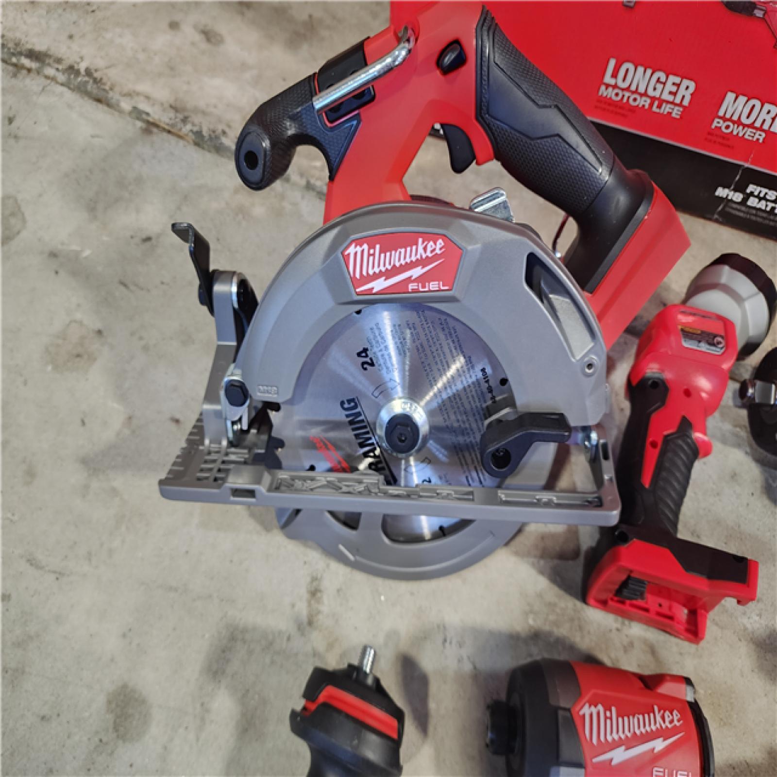 HOUSTON LOCATION - AS-IS (APPEARS LIKE NEW) Milwaukee M18 FUEL 18V Lithium-Ion Brushless Cordless Combo Kit with Two 5.0 Ah Batteries  1 Charger  2 Tool Bags (7-Tool)