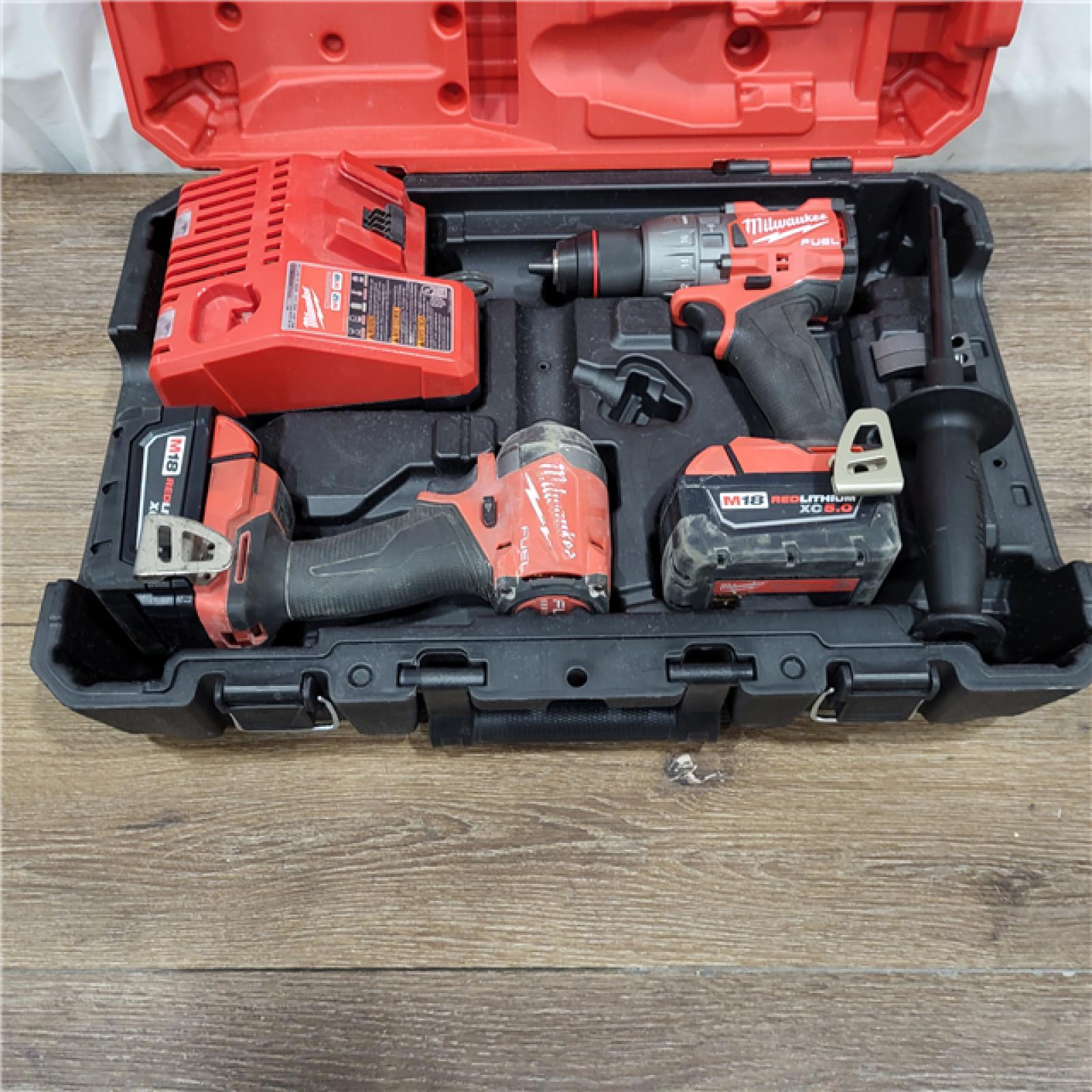 AS-IS M18 FUEL 18V Lithium-Ion Brushless Cordless Hammer Drill and Impact Driver Combo Kit (2-Tool) with 2 Batteries