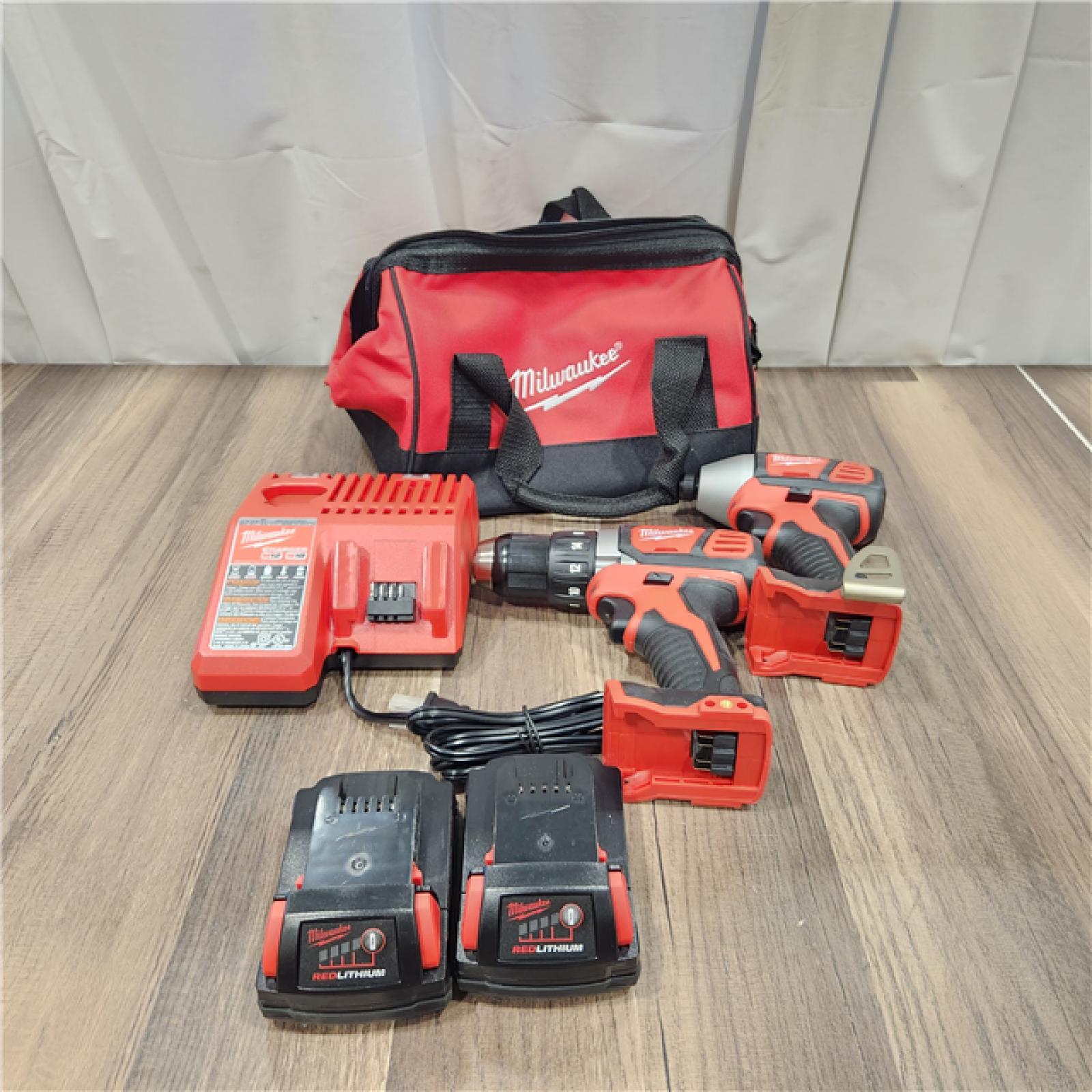 AS IS Milwaukee M18 18V Cordless Brushed 2 Tool Drill/Driver and Impact Driver Kit