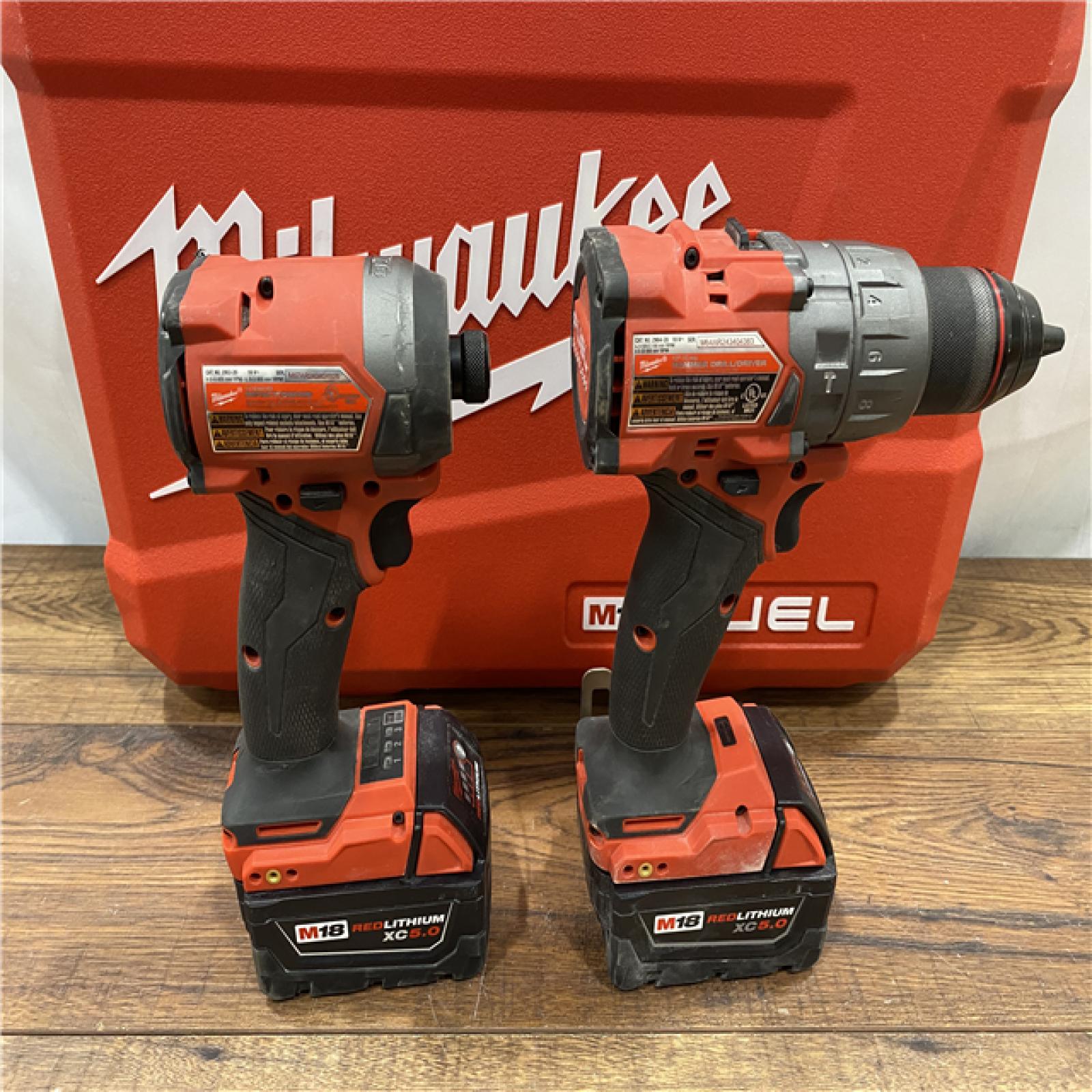 AS IS Milwaukee M18 FUEL 18V Lithium-Ion Brushless Cordless Hammer Drill and Impact Driver Combo Kit (2-Tool) with 2 Batteries