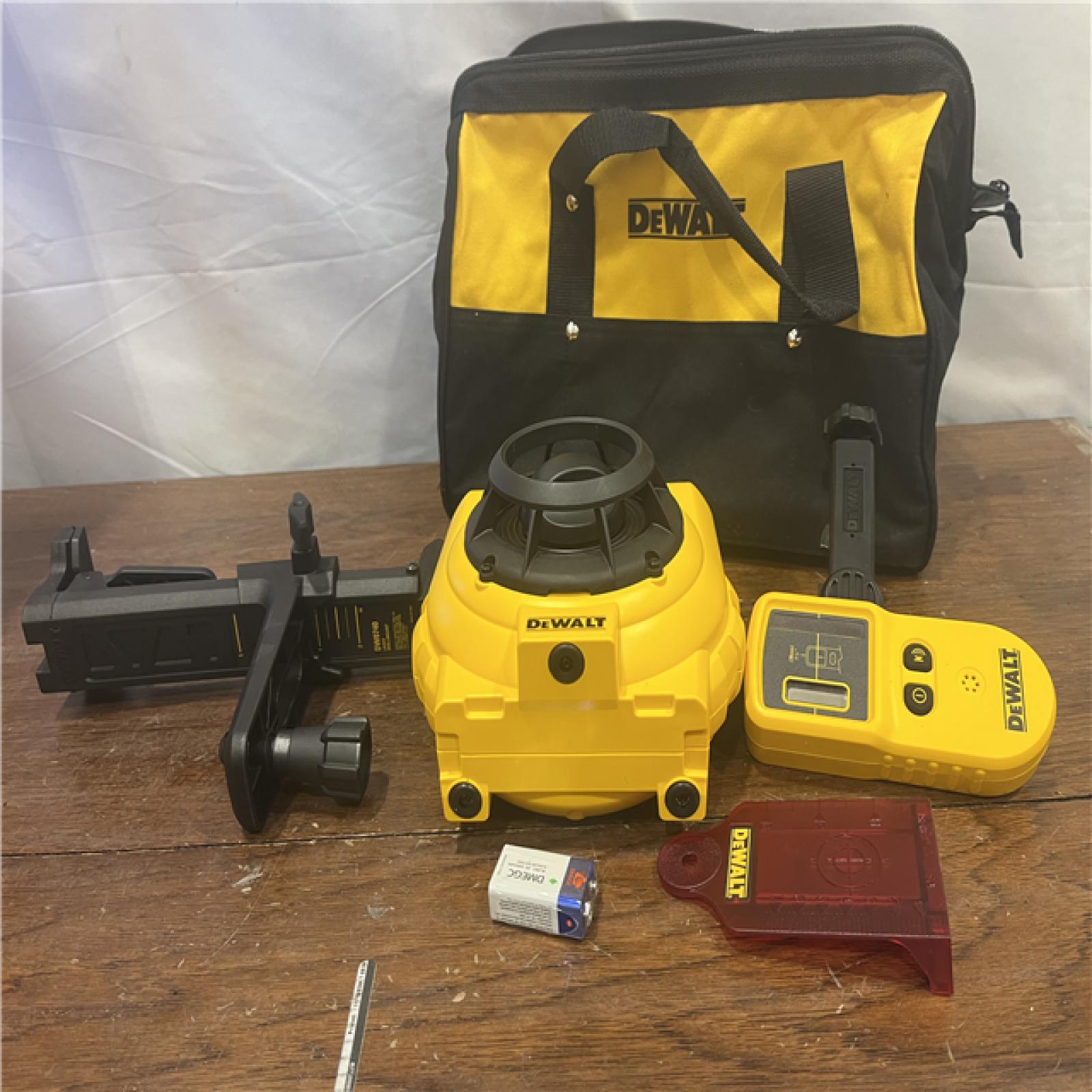 AS-ISDewalt 150 ft. Red Self-Leveling Rotary Laser Level with Detector & Clamp, Wall Mount, Remote, Bag, (2) D & (1) 9-Volt battery