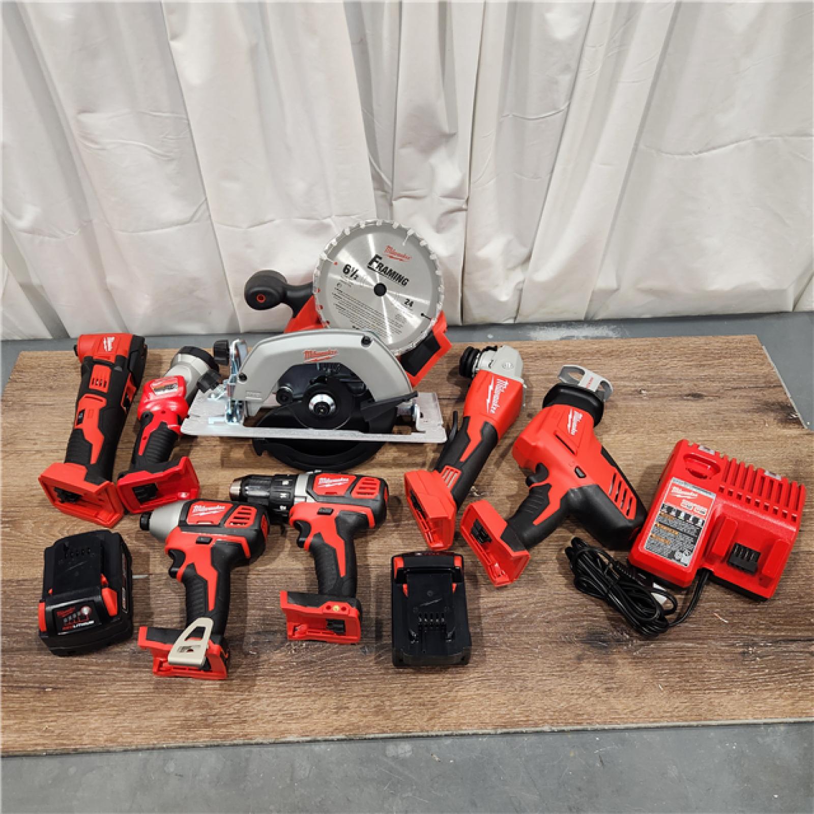 AS-IS Milwaukee M18 18-Volt Lithium-Ion Cordless Combo Kit 7-Tool with 2-Batteries, Charger and Tool Bag