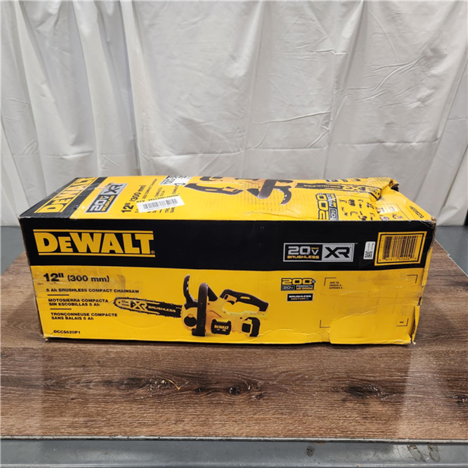 AS-IS Dewalt 7605686 12 in. 20V Battery Powered Chainsaw