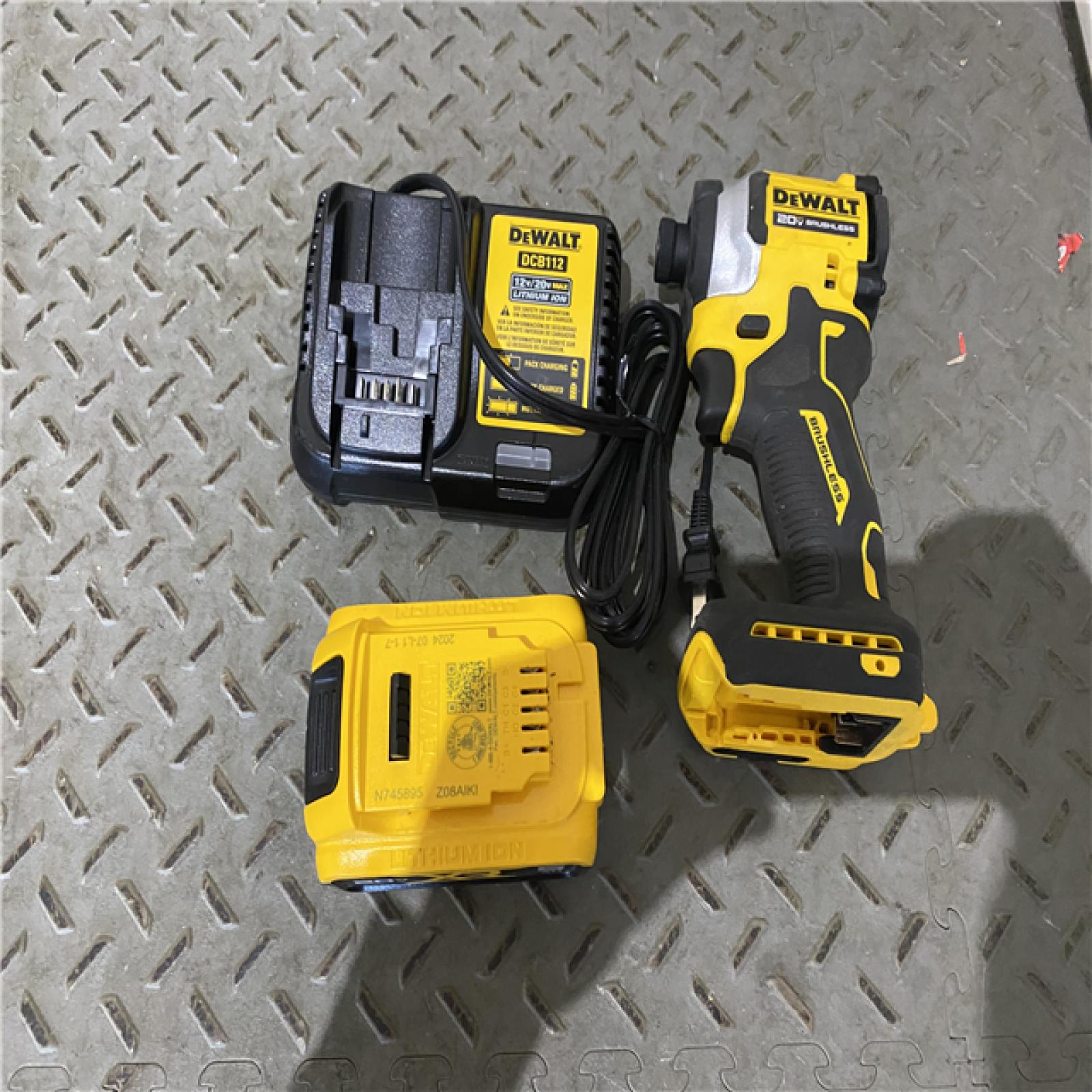 Houston location AS-IS DEWALT ATOMIC 20V MAX Lithium-Ion Cordless 1/4 in. Brushless Impact Driver Kit, 5 Ah Battery, Charger, and Bag