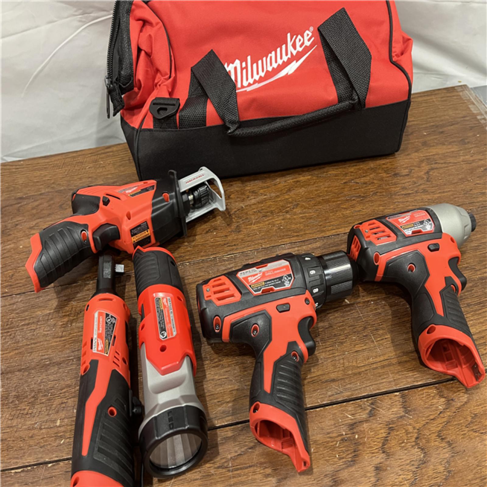 AS-IS MILWAUKEE M12 12V Lithium-Ion Cordless Combo Kit (5-Tool) with Two 1.5Ah Batteries, Charger & Tool Bag