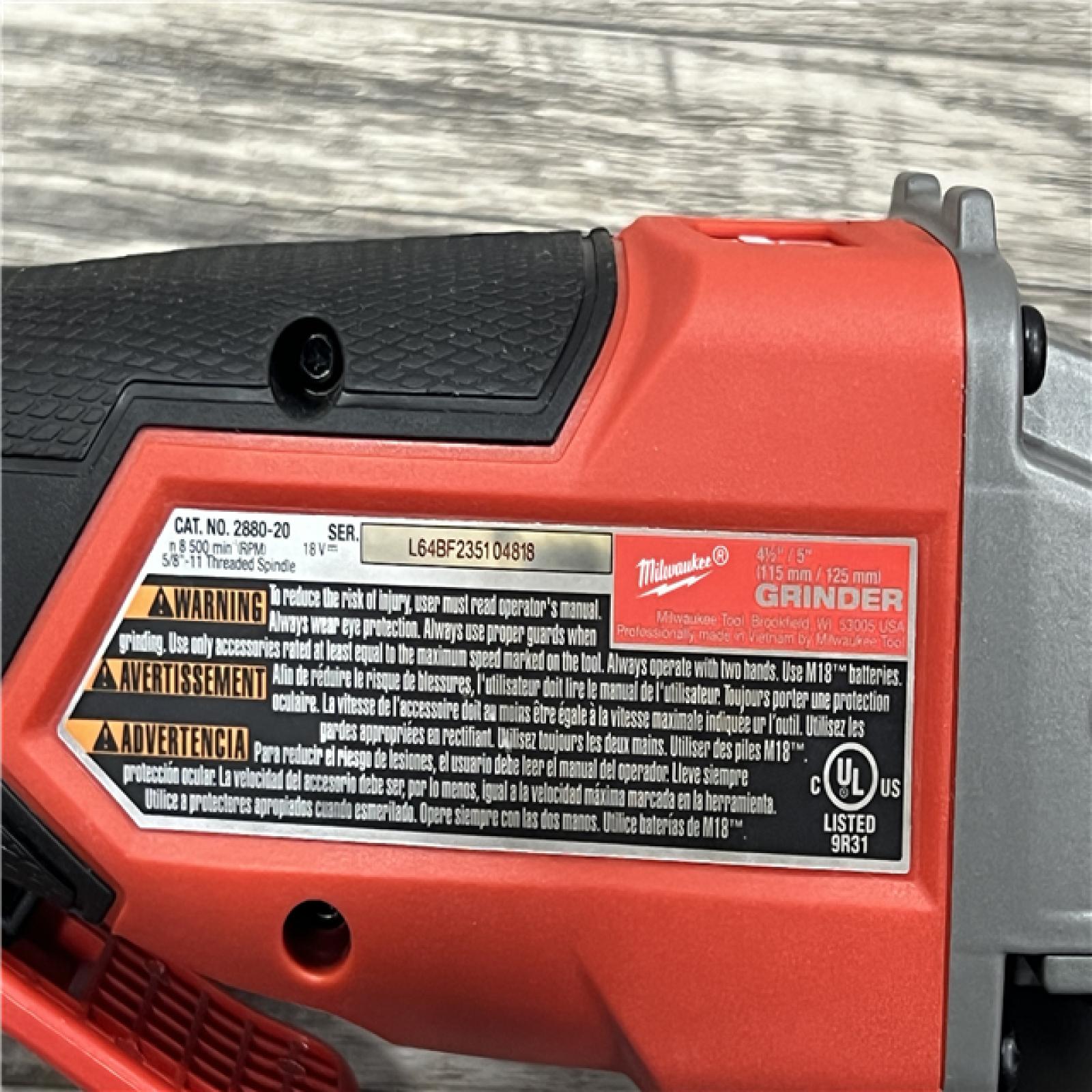 AS-IS Milwaukee 2880-20 M18 FUEL 18-Volt Lithium-Ion Brushless Cordless 4-1/2 in./5 in. Grinder W/Paddle Switch (Tool-Only)