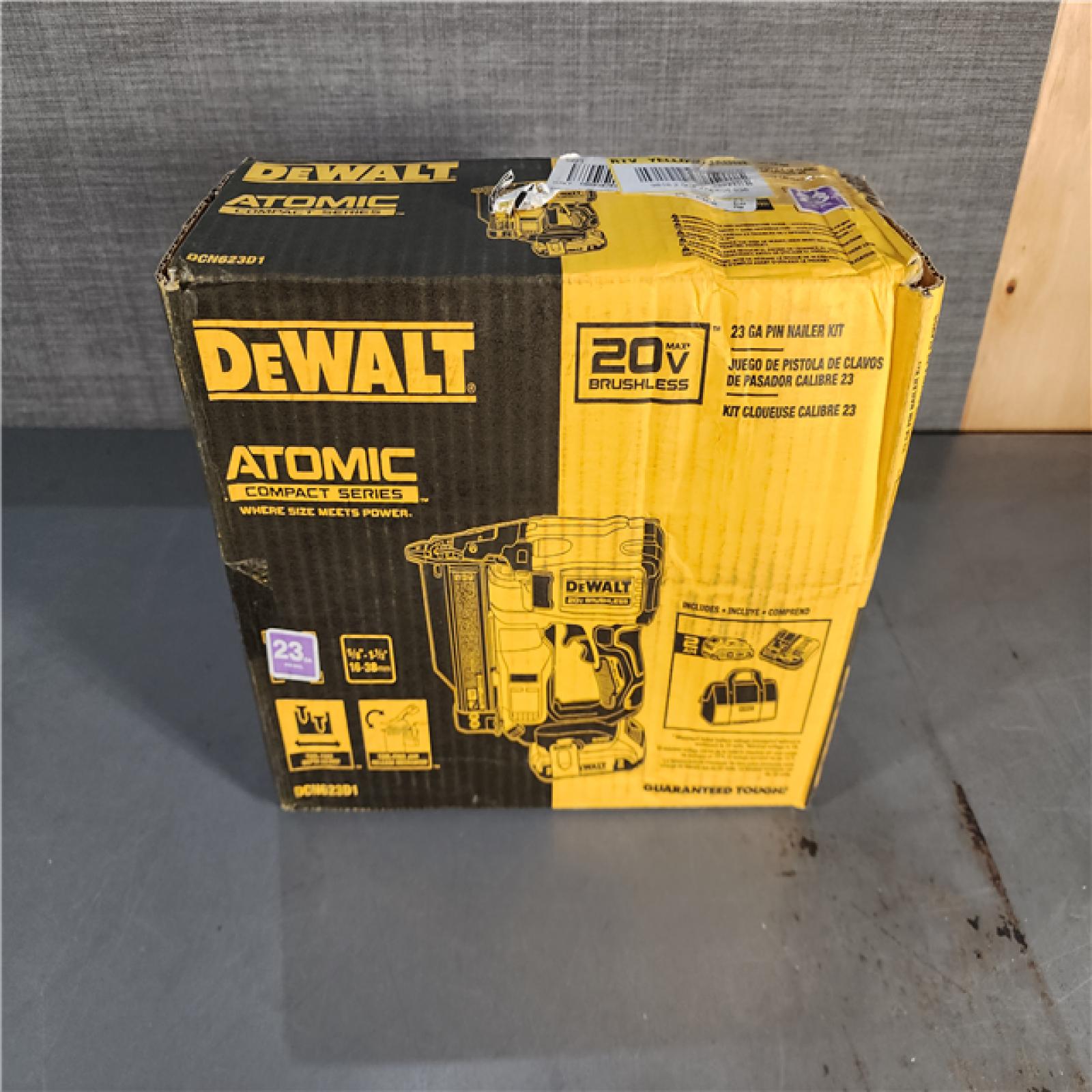 HOUSTON LOCATION - AS-IS DEWALT ATOMIC 20V MAX Lithium Ion Cordless 23 Gauge Pin Nailer Kit with 2.0Ah Battery and Charger