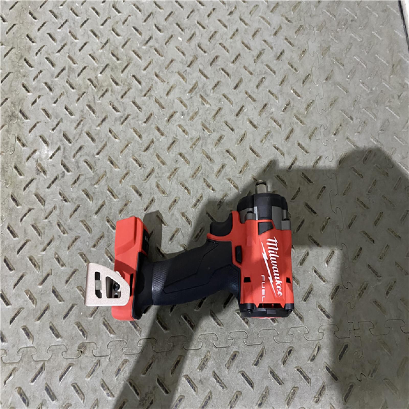 Houston location AS-IS Milwaukee M18 18V Fuel 1/2  Compact Impact with Friction Ring 2855-20