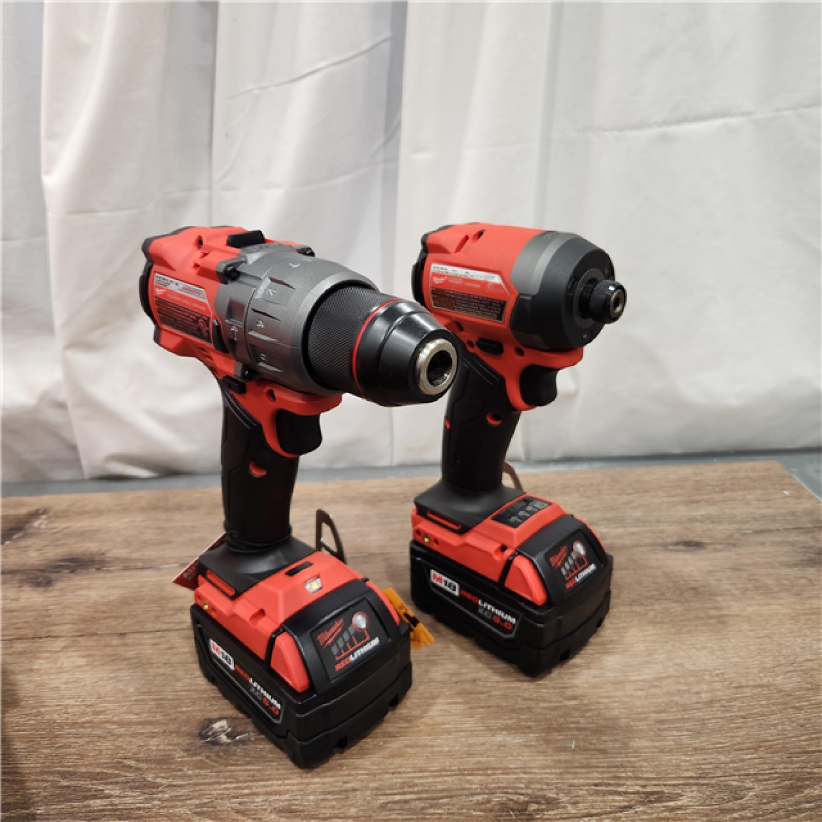 AS-IS Milwaukee M18 FUEL 18V Lithium-Ion Brushless Cordless Hammer Drill and Impact Driver Combo Kit (2-Tool) with 2 Batteries