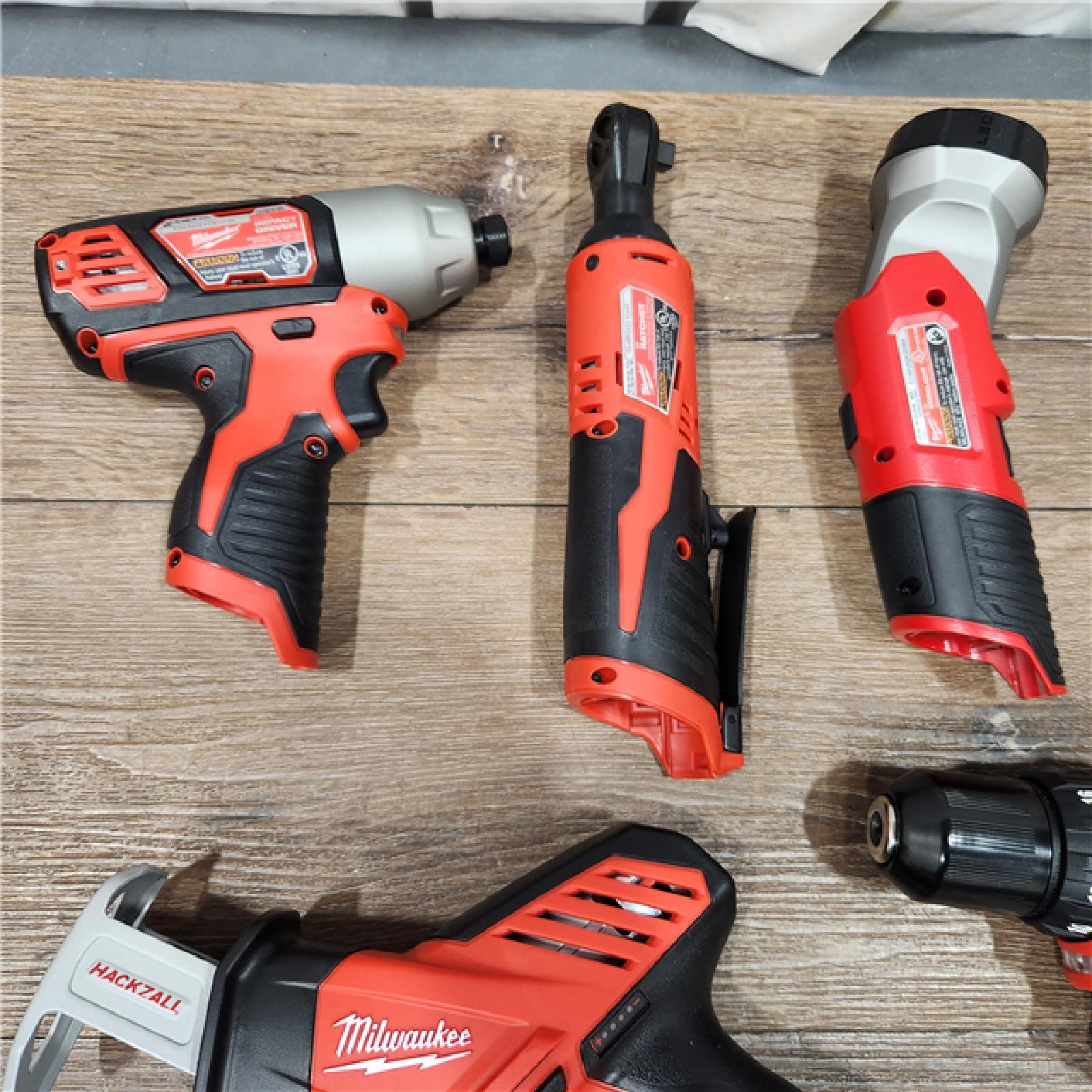 AS-IS MILWAUKEE M12 12V Lithium-Ion Cordless Combo Kit (5-Tool) with Two 1.5Ah Batteries, Charger & Tool Bag