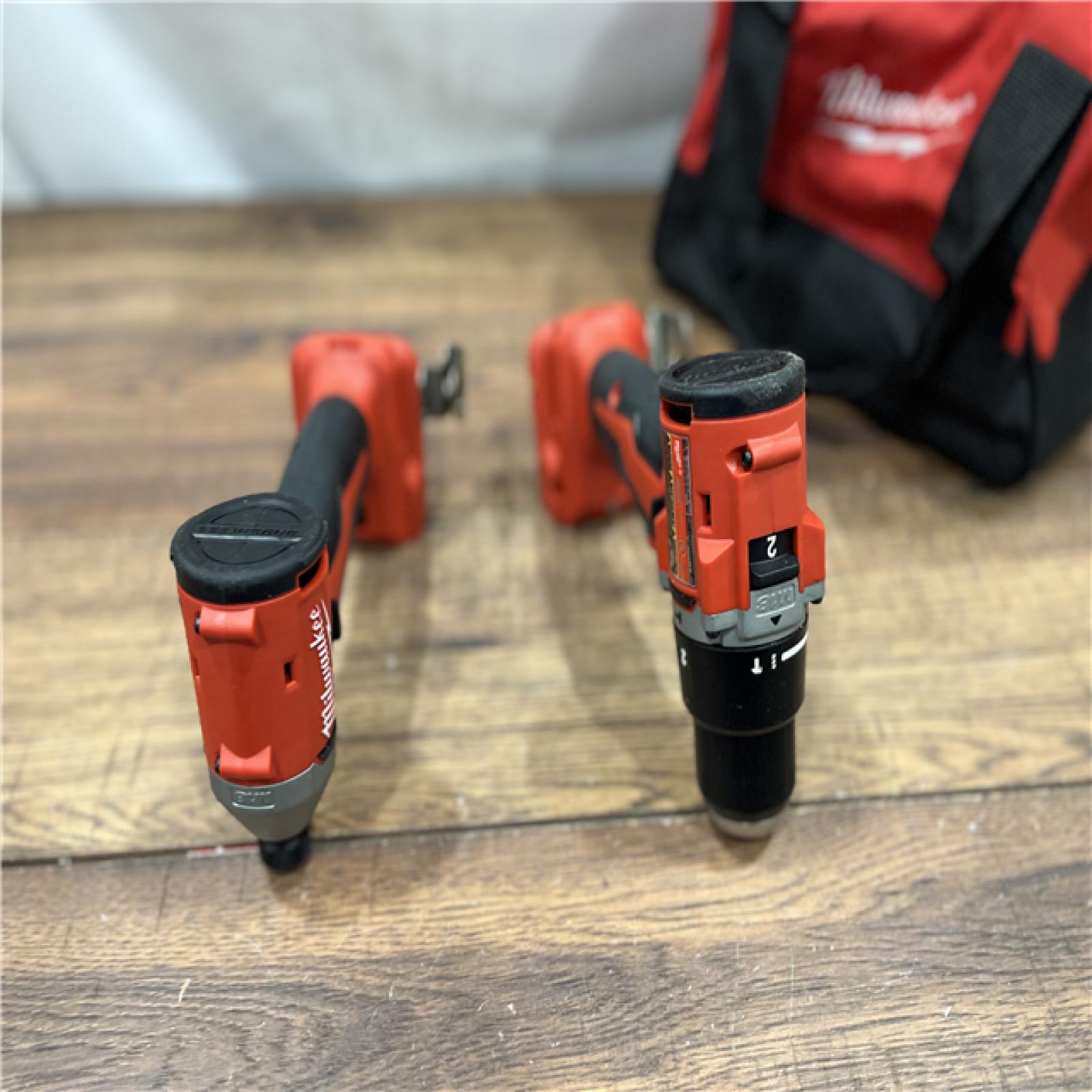 AS-IS M18 18-Volt Lithium-Ion Brushless Cordless Compact Hammer Drill/Impact Combo Kit (2-Tool) with (2) Batteries, Bag