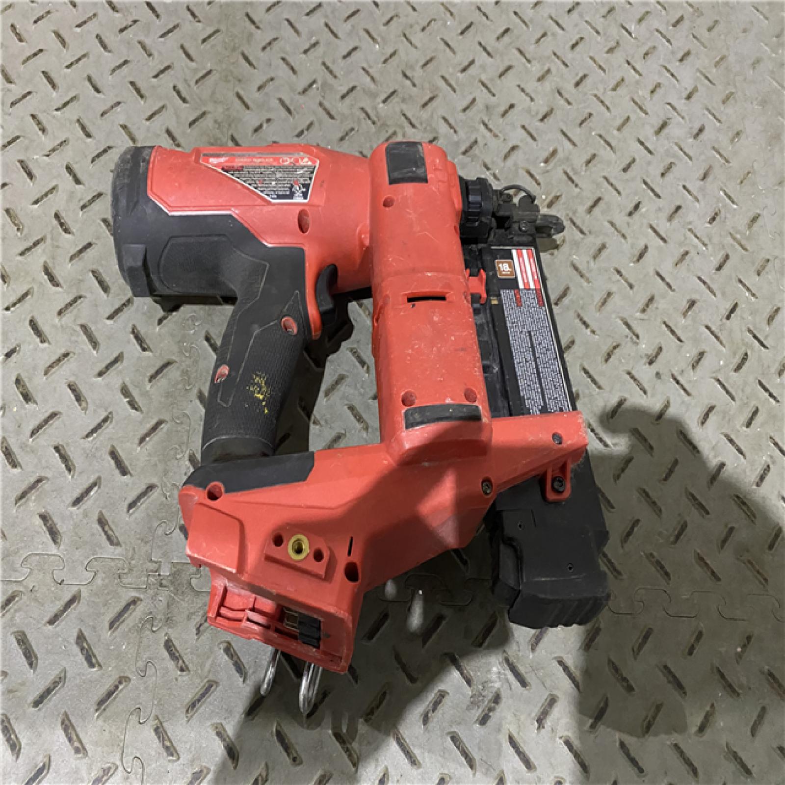 Houston location AS-IS Milwaukee M18 Fuel 18V Brushless 18-Gauge Brad Nailer 2746-20 (Bare Tool)