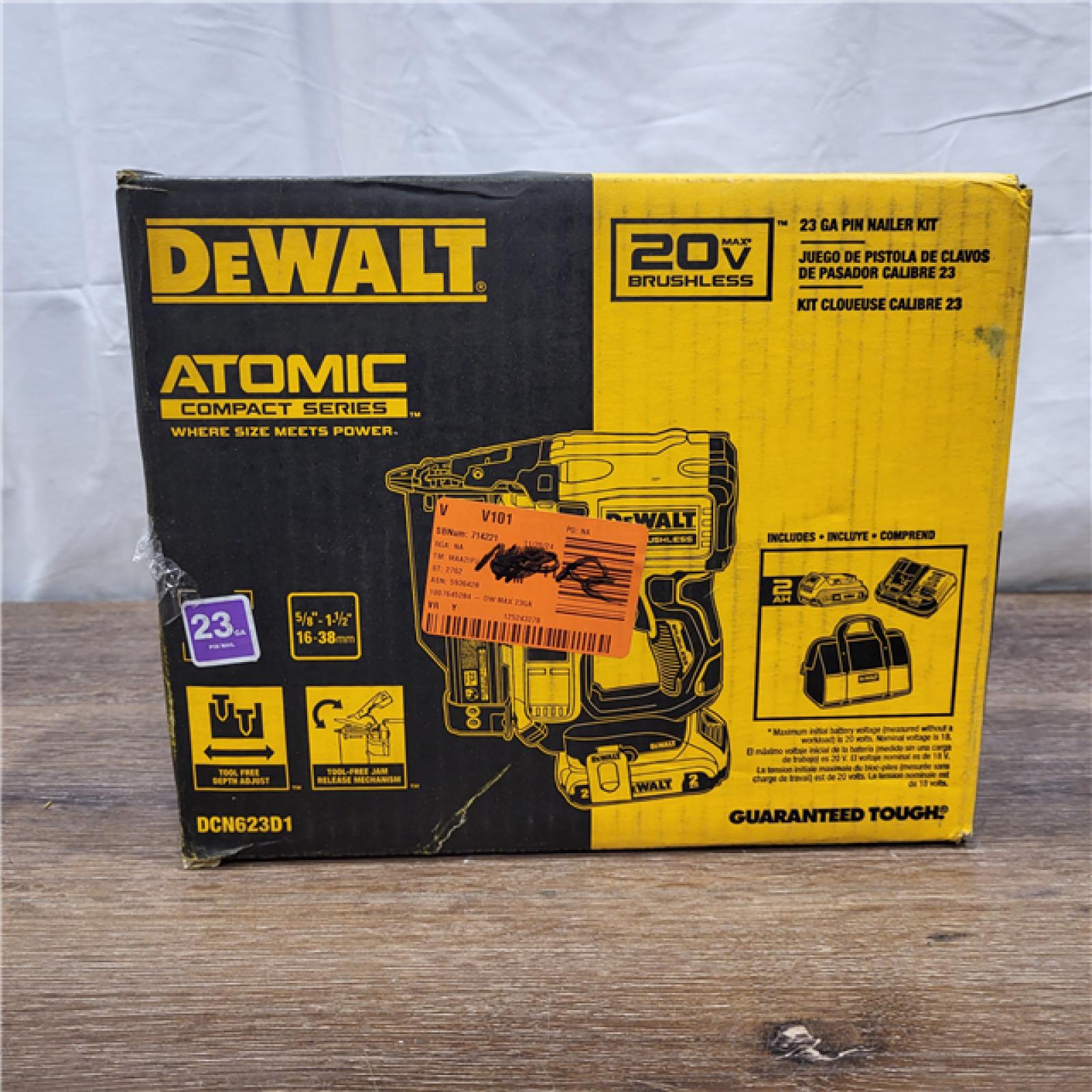 AS-IS DEWALT ATOMIC 20V MAX Lithium Ion Cordless 23 Gauge Pin Nailer Kit with 2.0Ah Battery and Charger