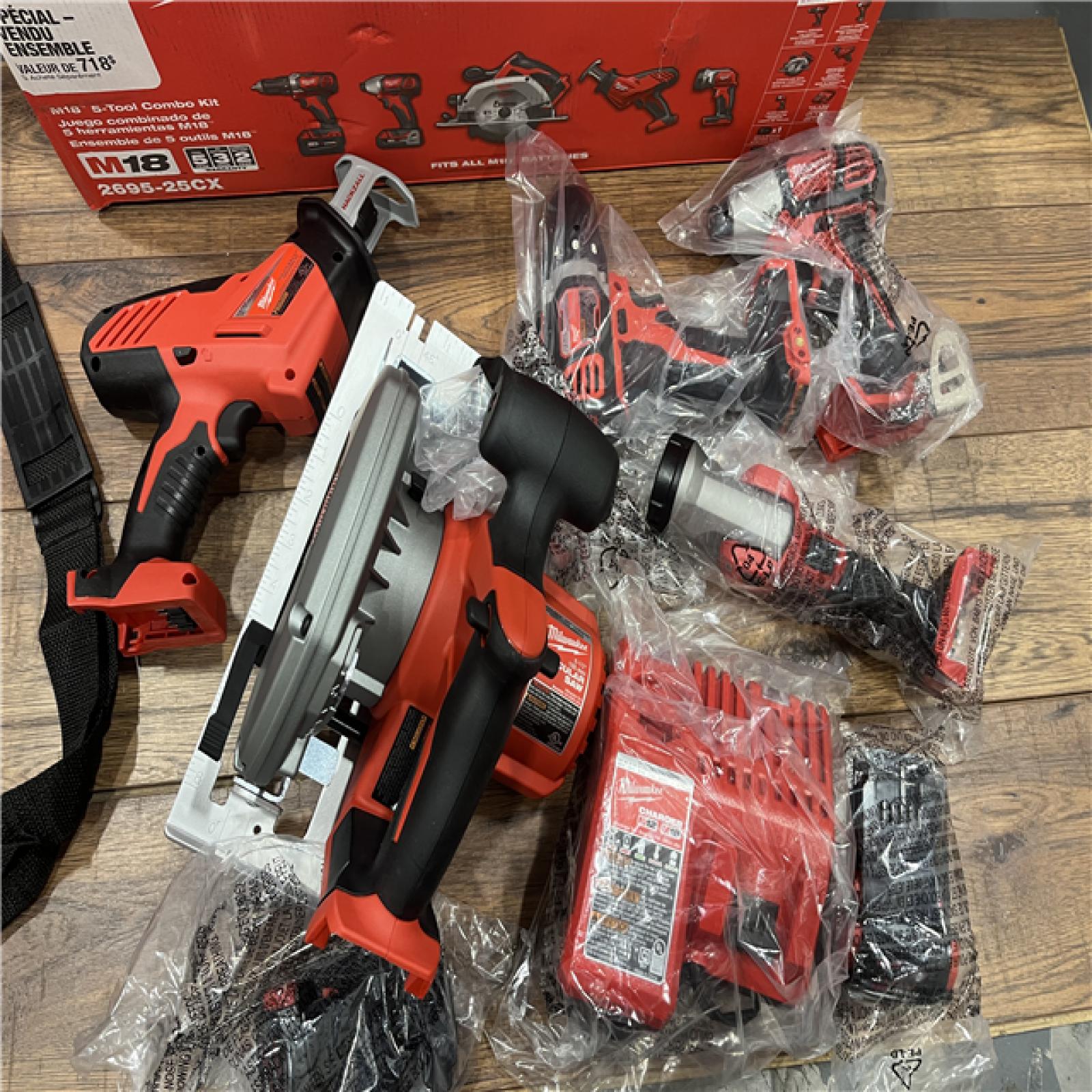 AS-IS Milwaukee M18 18-Volt Lithium-Ion Cordless Combo Tool Kit (5-Tool) with (1) 3.0Ah and (1) 1.5Ah Battery, (1) Charger, (1) Tool Bag